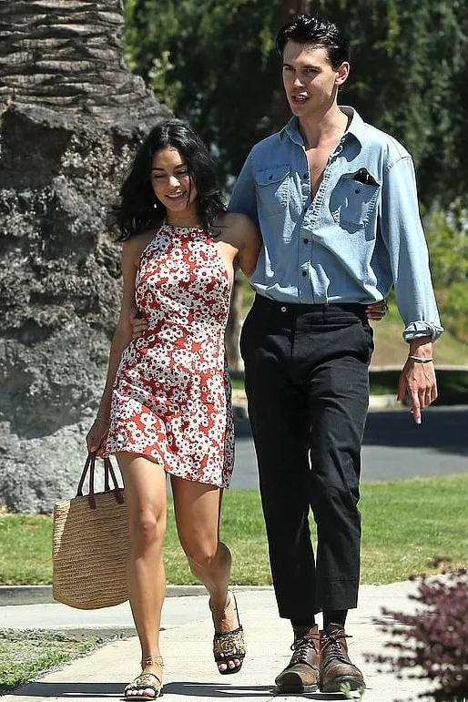 vanessa-hudgens-poppy-print-dress-gucci-slides-with-austin-butler.jpg