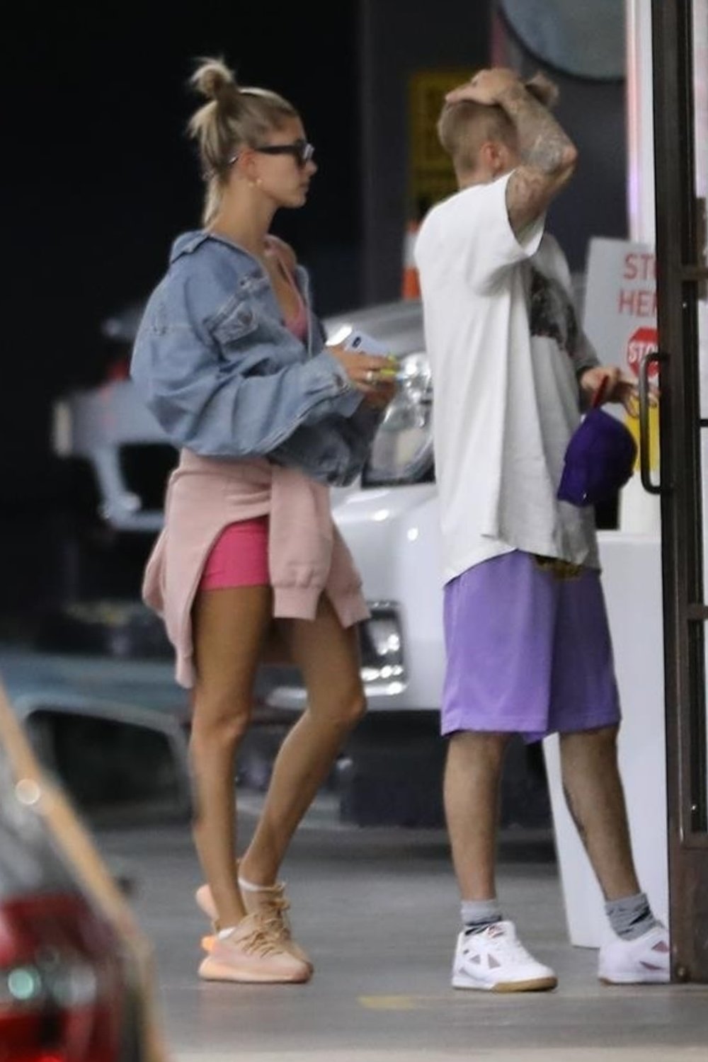 hailey-bieber-pink-shorts-and-sneakers-in-soho.jpg