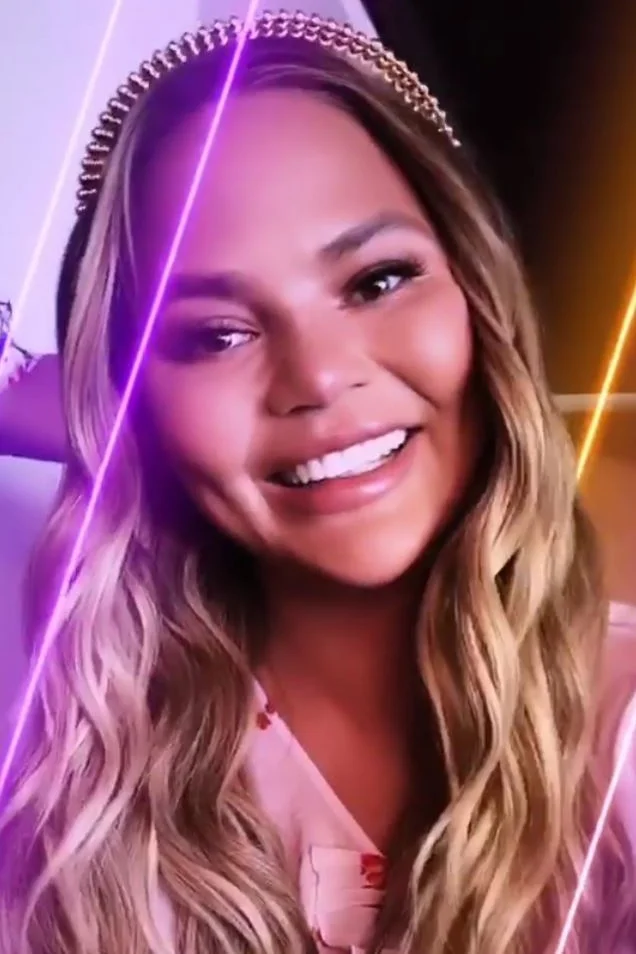 chrissy-teigen-pink-printed-dress-on-instagram-story.jpg