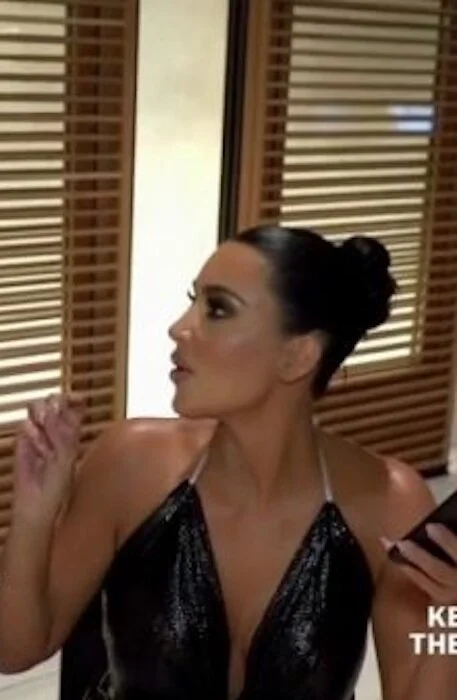 kim-kardashian-black-cowl-halter-top-keeping-up-with-the-kardashians-18.jpg