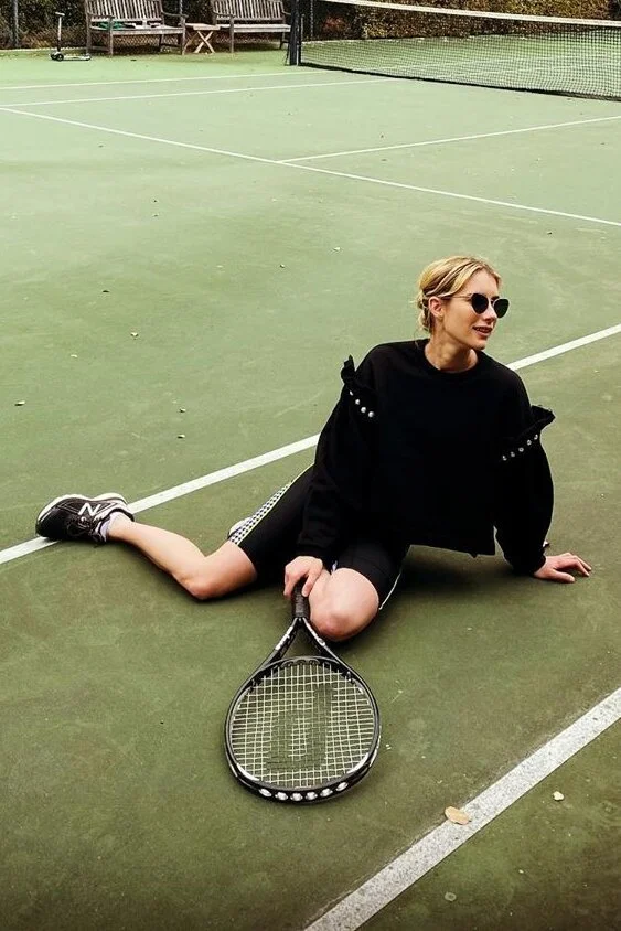 emma-roberts-black-ruffle-sleeve-sweatshirt.jpg
