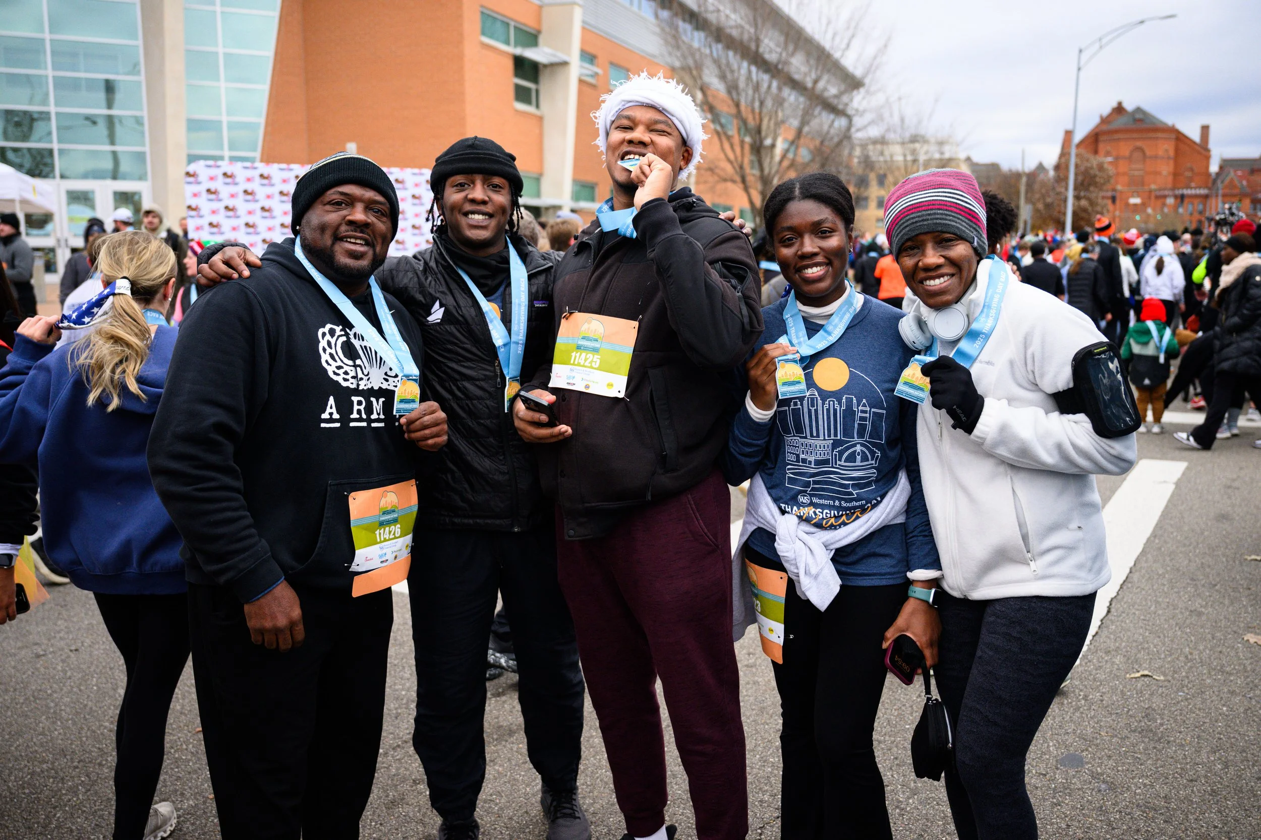 2025 Thanksgiving Race Family after crossing the finish line.