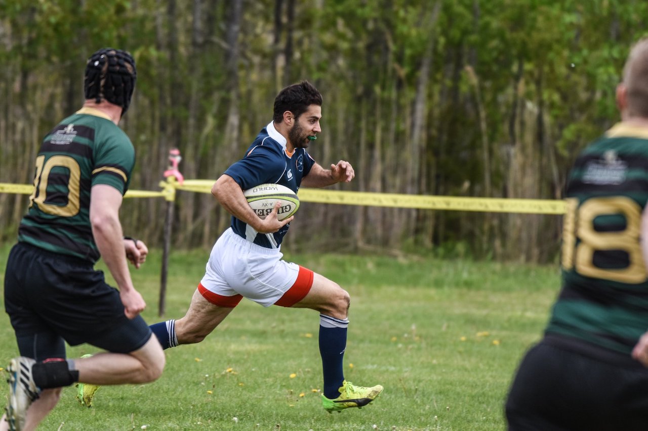 Running with the ball Upper Valley Rugby Mountain Men