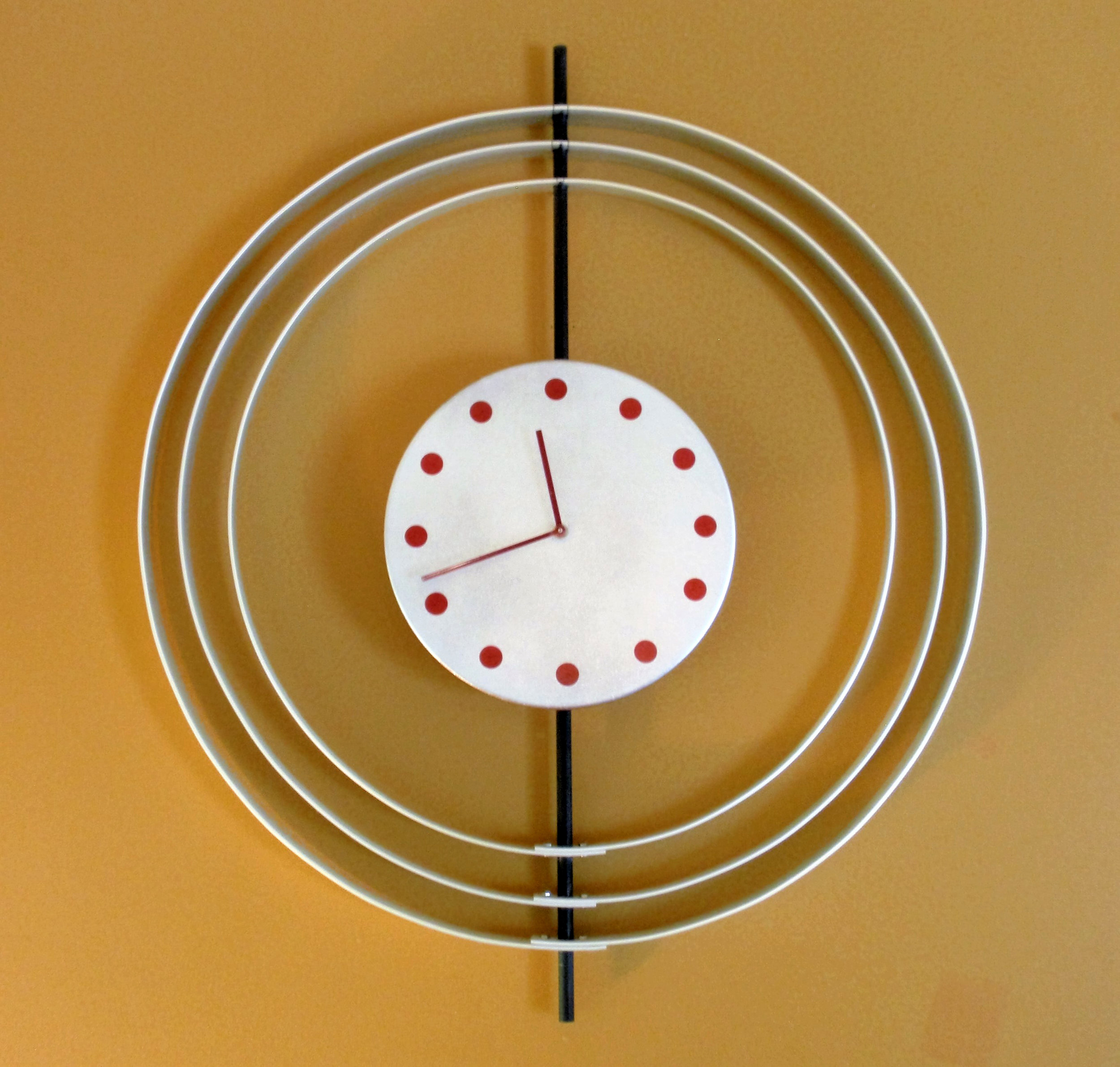 Rings wall clock