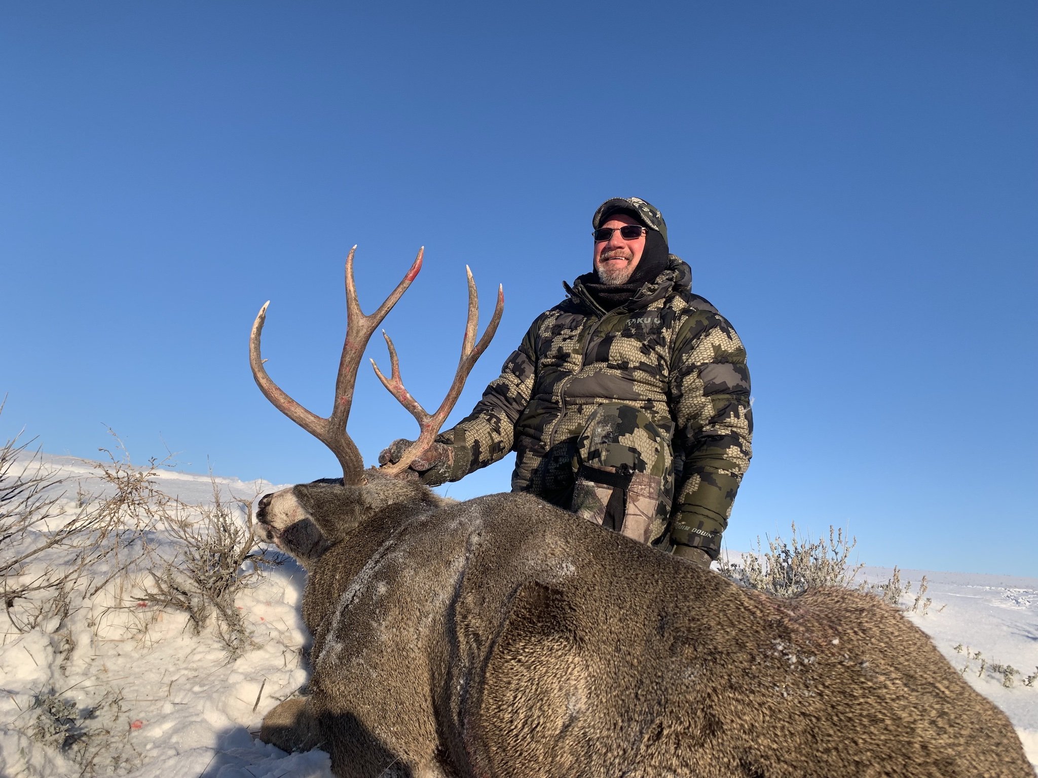 Hunter with Large Buck.jpg