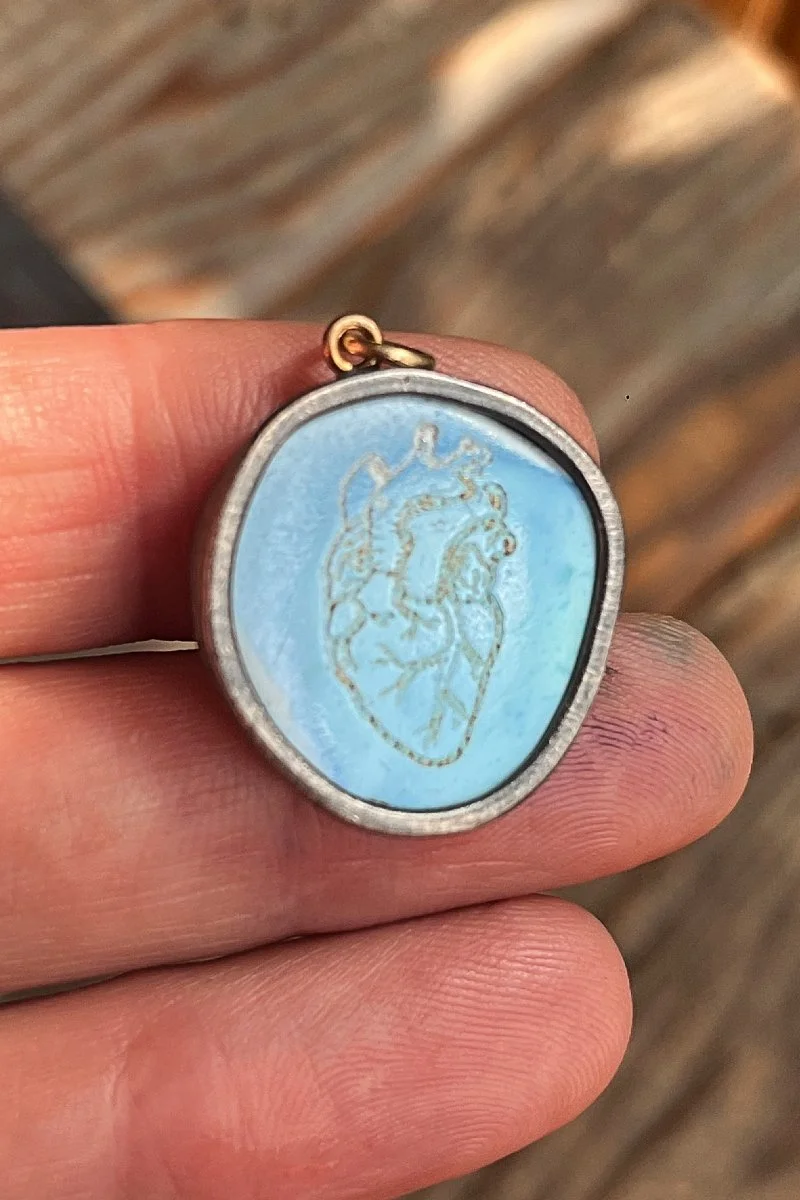 turquoise_etched_heart_held.jpg