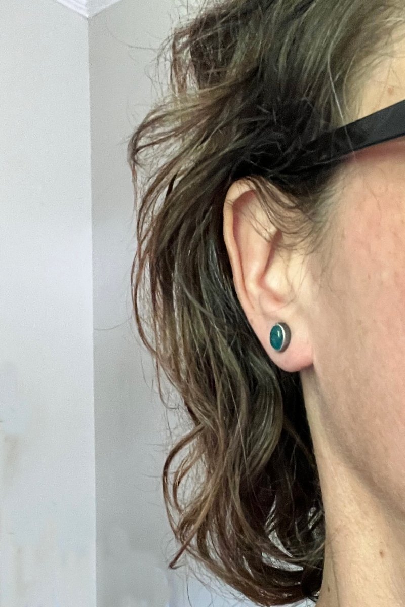 grandidierite_studs_worn.jpg
