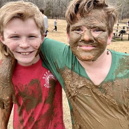 muddy kids at confirmation retreat