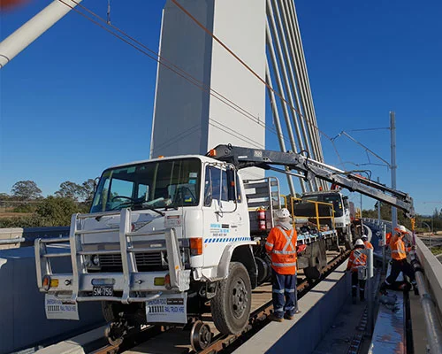SM756 - Hirail Crane Truck w/ Tailgate Lifter
