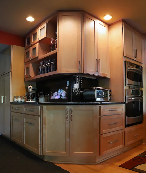 Large serving surface for parties! Lots of display in framed glass windows and open shelves. Extra storage in doors and drawers, even on angles. Storage closet worked into unit.