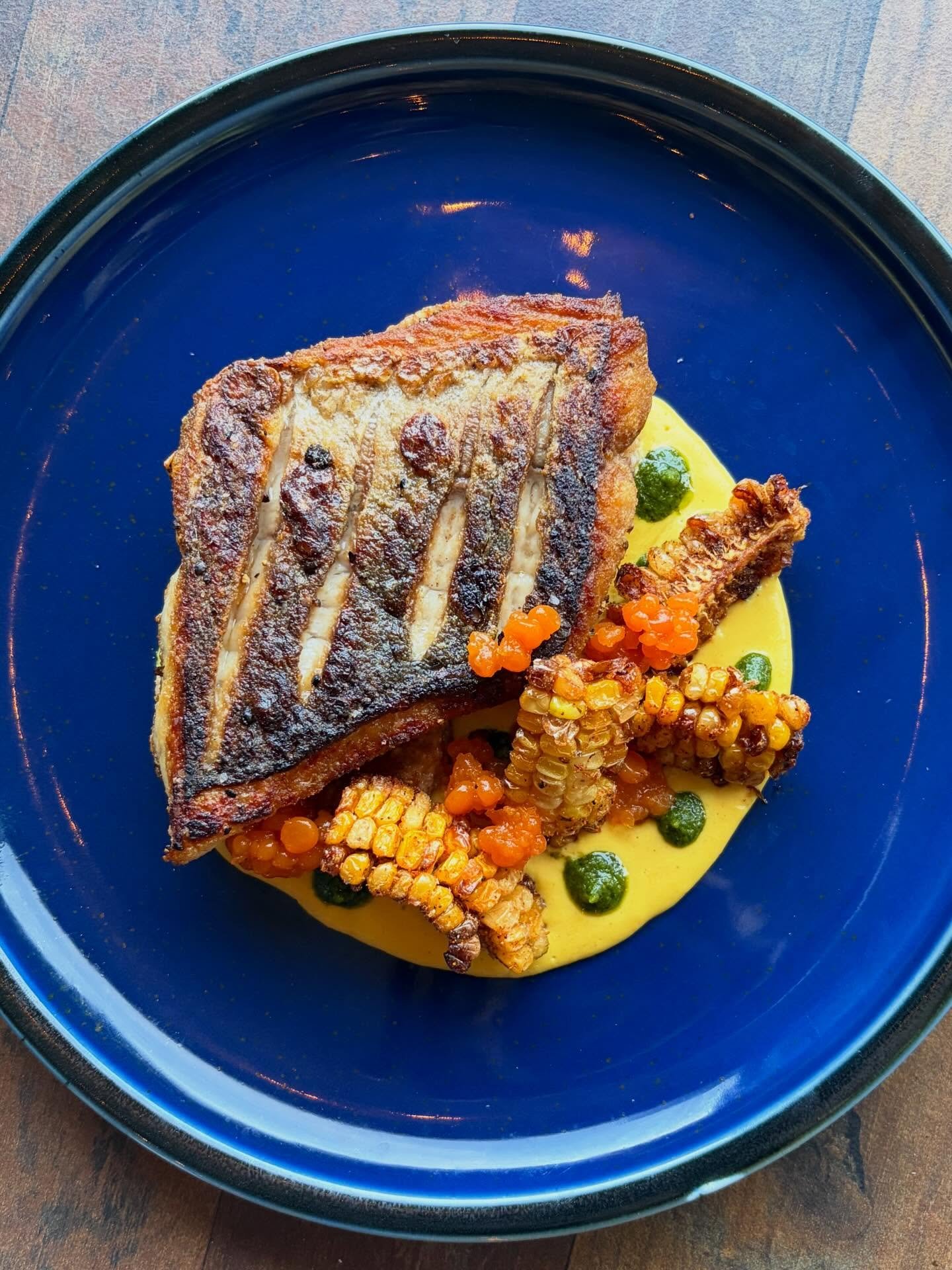 Local NC speckled trout with carolina gold chamomile rice cakes, habanero faux caviar, pesto, corn ribs, &amp; corn pure&eacute; ✨

Reservations are available online and by phone. Bar open til 11pm Friday &amp; Saturday! 

#blowingrock #blowingrocknc
