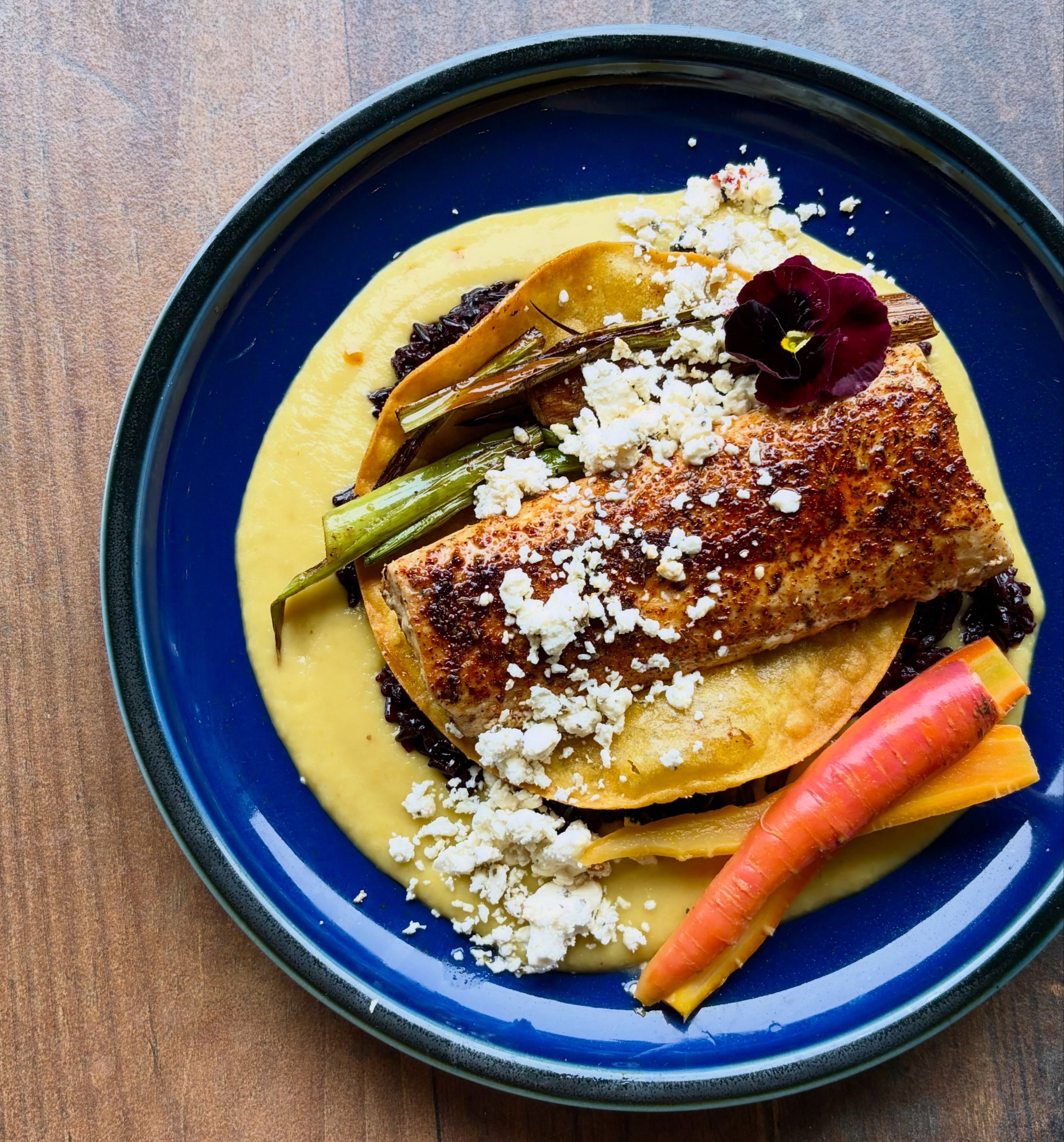 Blackened Mahi with forbidden rice, fried tortilla, feta, @hedgefamilyfarm peach &amp; hatch chile salsa verde and pickled rainbow carrots, and @atgfarm grilled leeks&mdash;

Reservations are available for dinner and all day on Sundays. Give us a cal