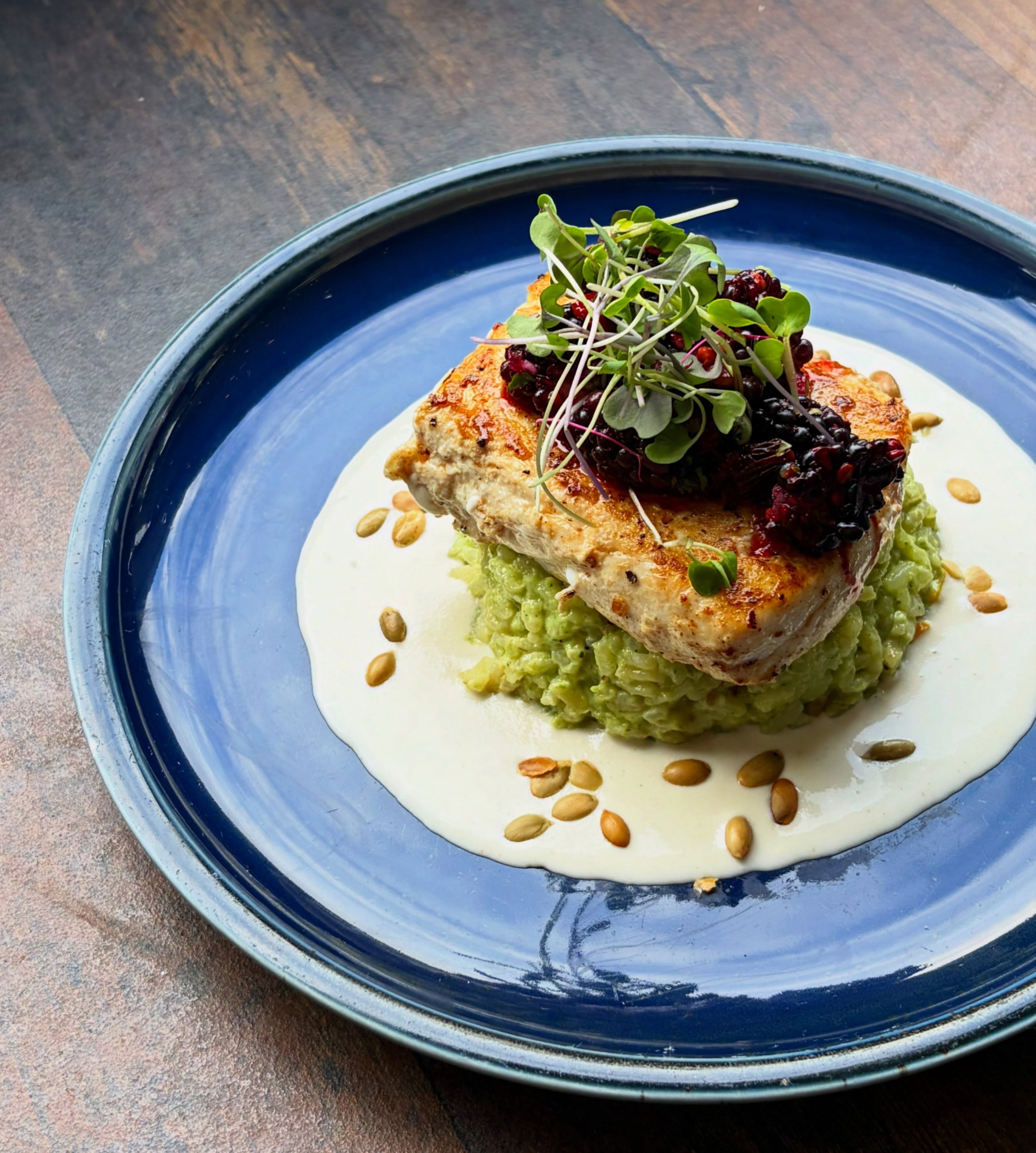 Halibut with poblano risotto @hedgefamilyfarm, blackberry &amp; chipotle salsa, ajoblanco, &amp; pumpkin seeds&mdash;

Reservations are available all day on Sundays. Give us a call or book online! 

#supportlocal #blowingrocknc #blowingrock