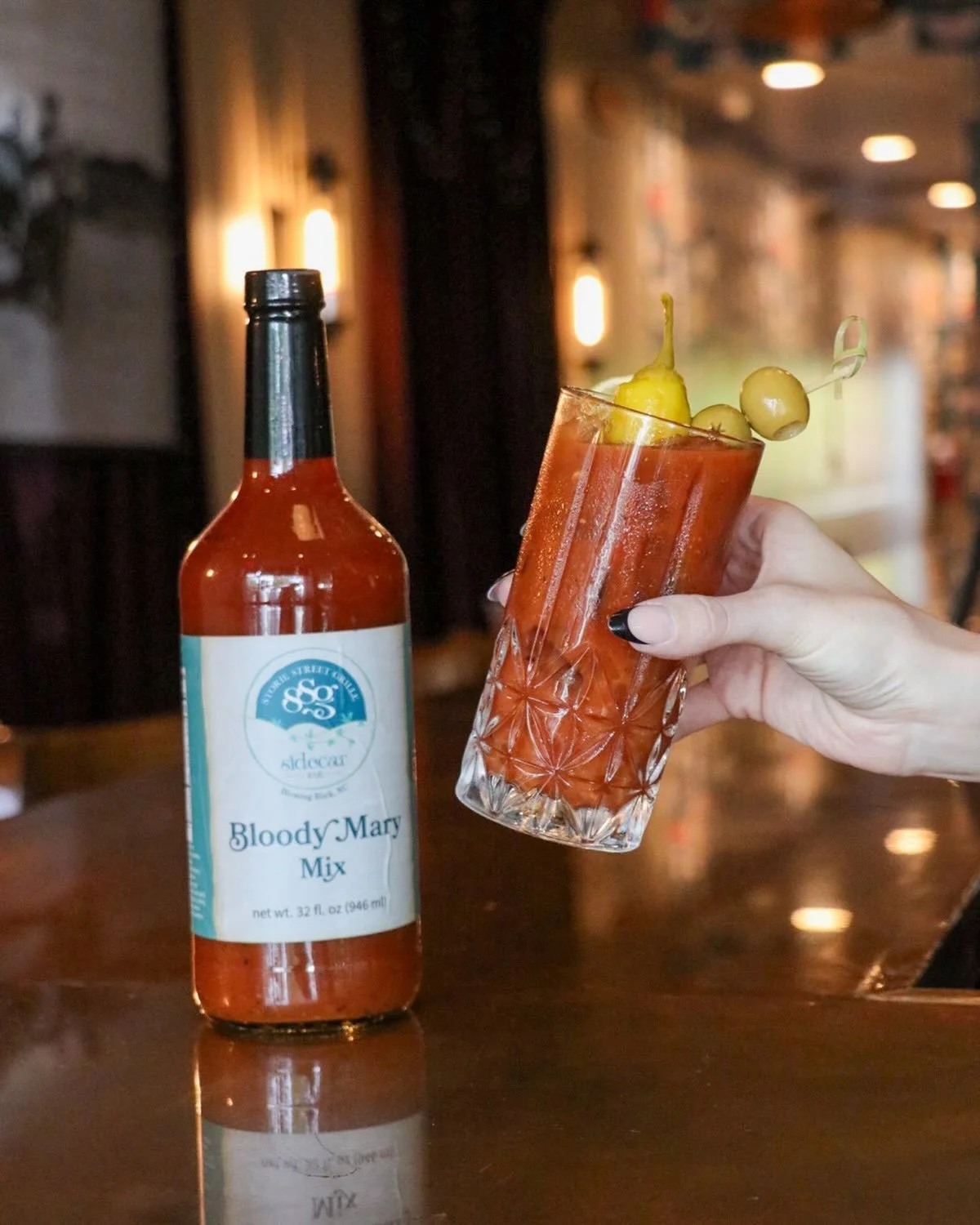 $2 off signature cocktails on Thursdays.
Stop by Sidecar Bar and test out the original SSG Bloody Mary! You can also pick up this NC produced and especially made for us bottle of mix.
#storiestreetgrille #bloodymary #blowingrocknc