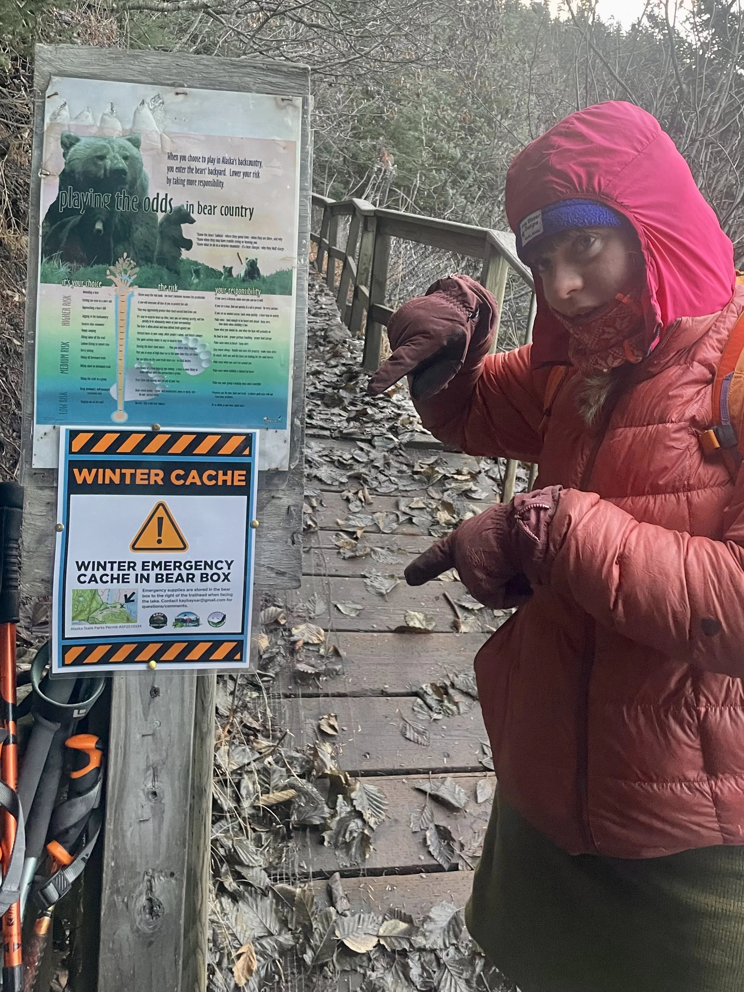 Winter emergency gear cache at Grewingk Glacier Lake for supporting wild-ice skaters