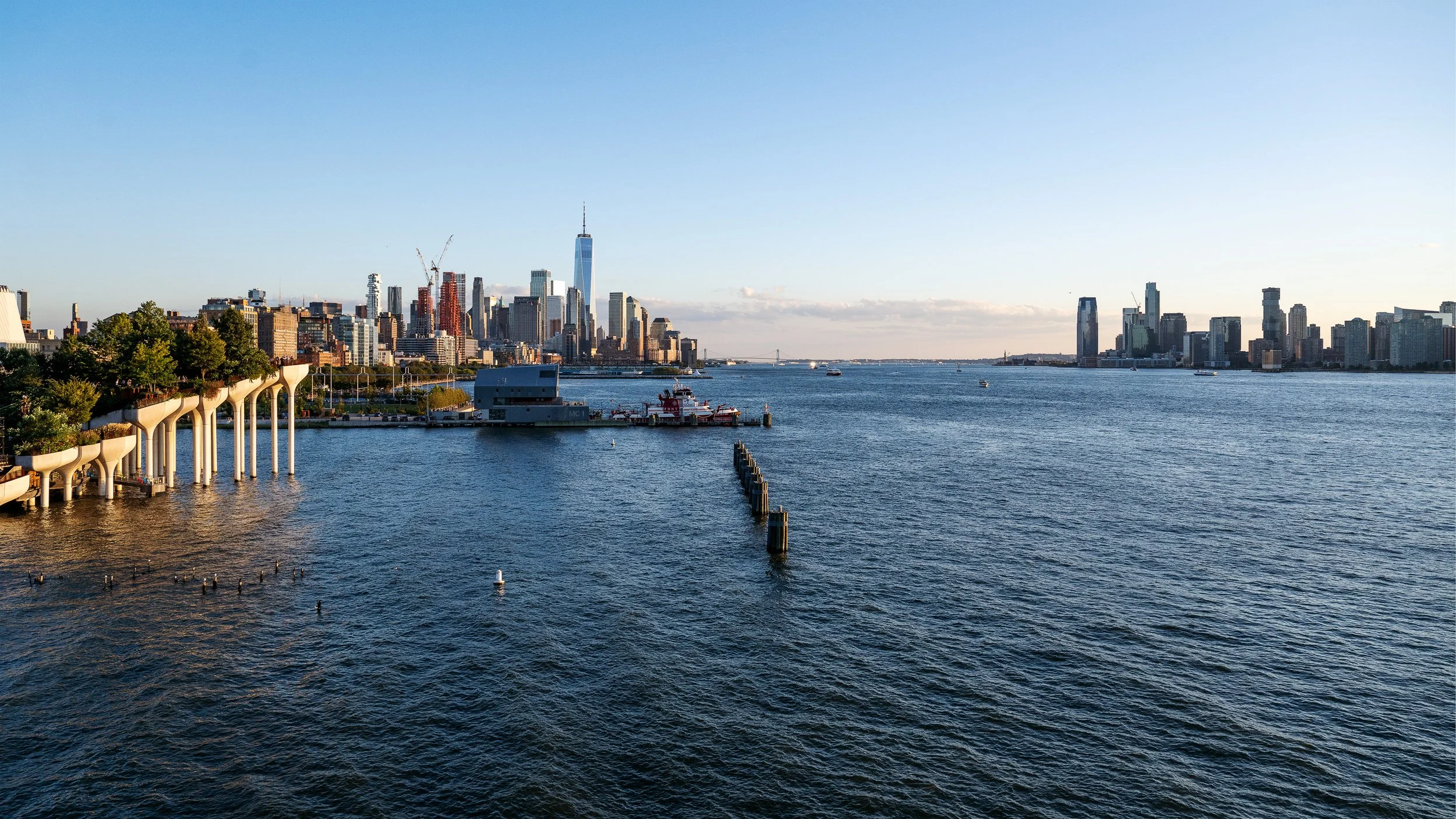 Hudson river over looking 1 World Trade Center and Jersey from wide angle shot