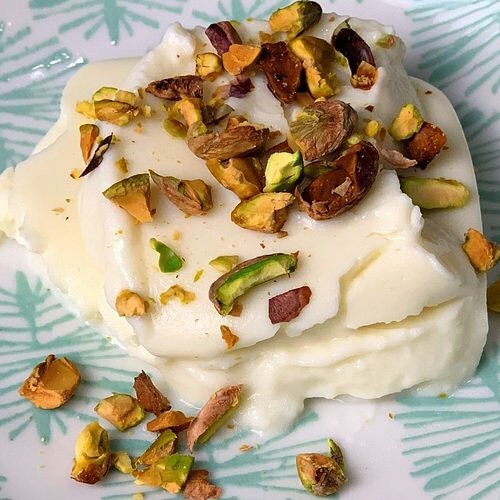 This is one version of our #Algerian rose water rice pudding and it&rsquo;s so deliciously refreshing! #Recipe for this mhalbiyya is up, and prep time is only 10 minutes. We love pistachios but the options for toppings are endless and included 😊. Ch