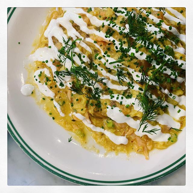 I love eggs. This dish with its slightly runny scramble, caramelized onions, subtle salmon, fresh lemon and horseradish hits the spot for lunch or dinner any day of the week. 
1 tbs organic safflower oil, 1 small onion thinly sliced and caramelized (