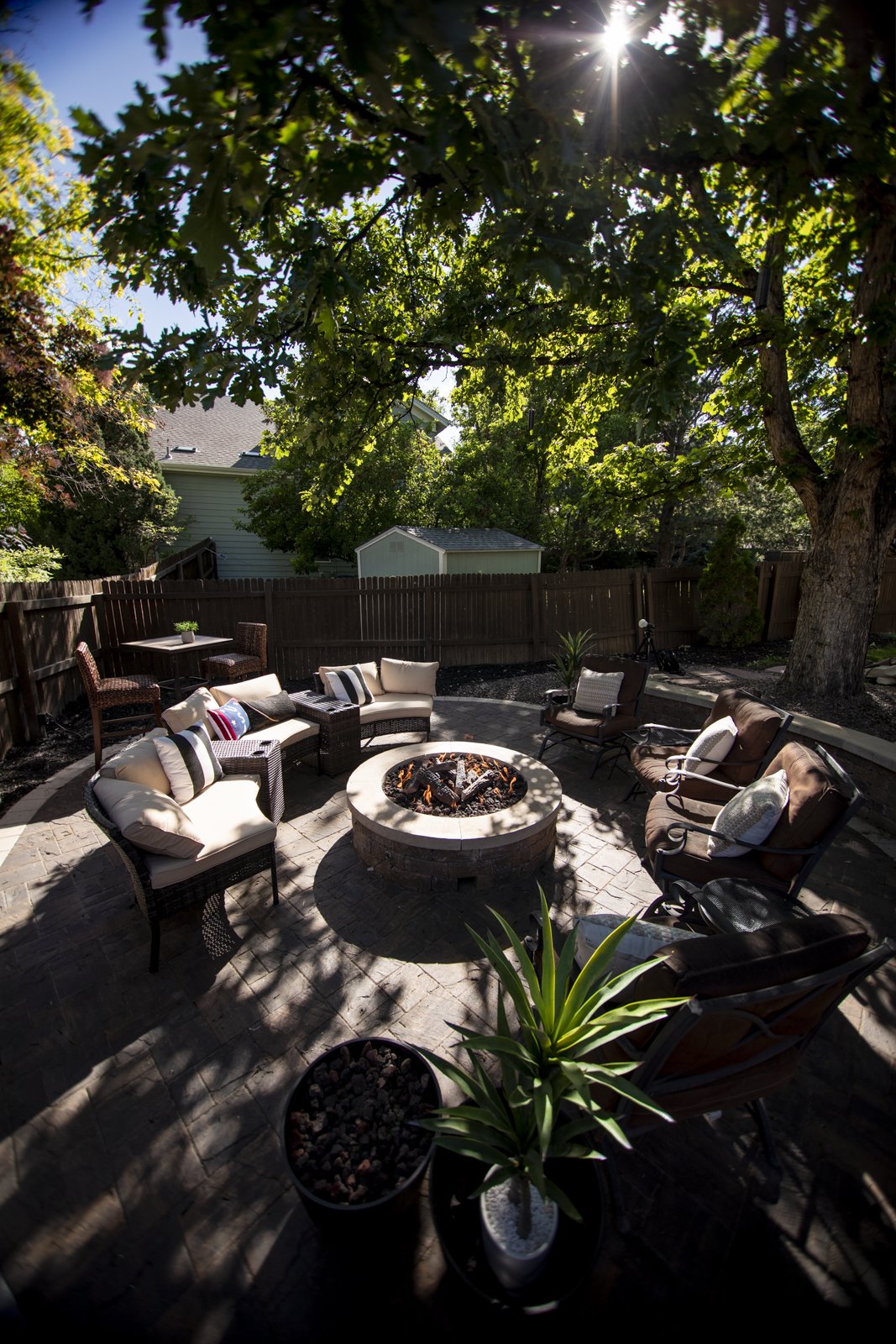  Patio with custom circular fire pit in the shade 