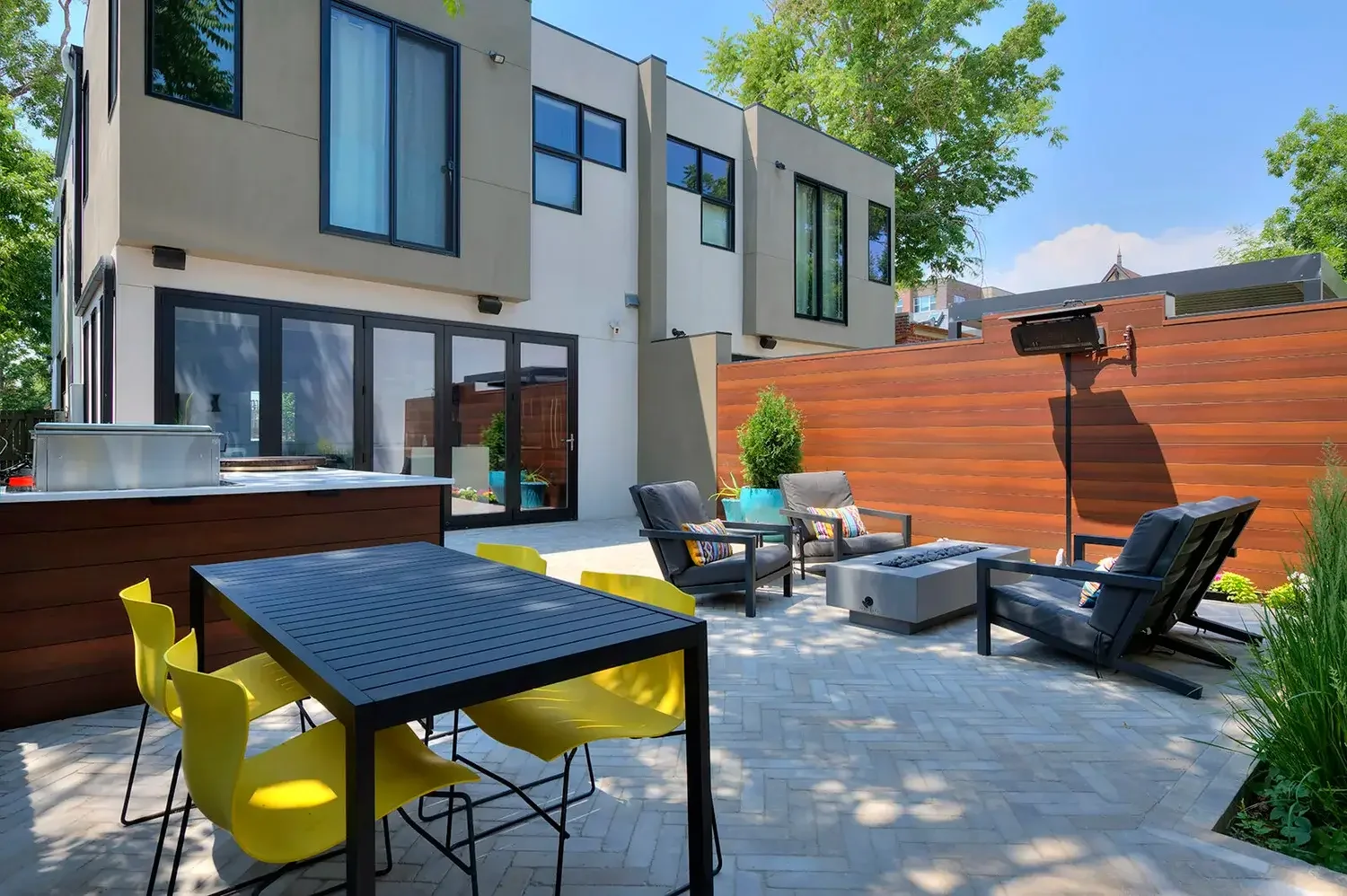 Modern Paver patio with lounge and dining seating