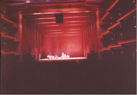 A poor photo, but the only one I have of looking at the stage at the piano I would later be playing.