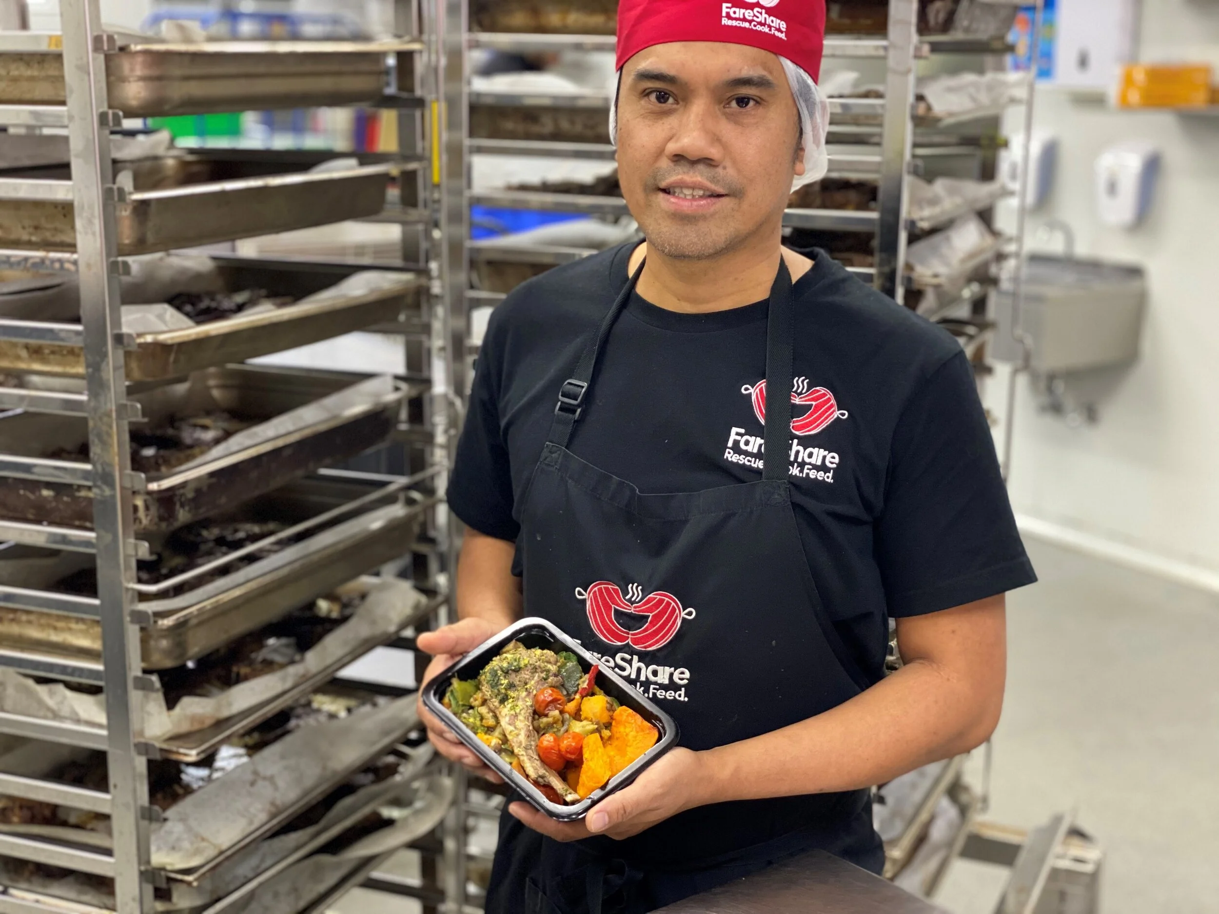Chef Arnel with lamp chop.jpg