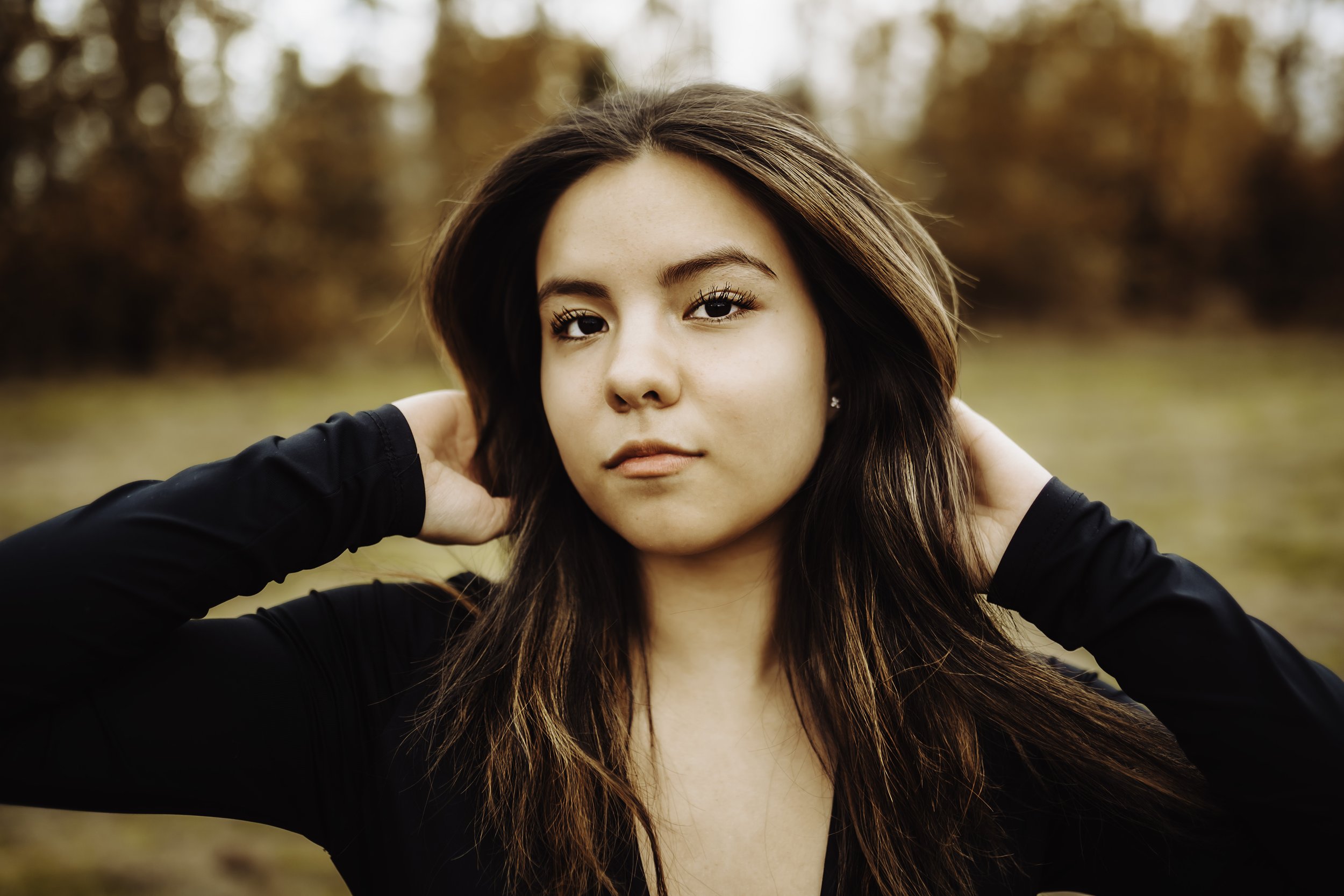 Senior girl playing with her hair