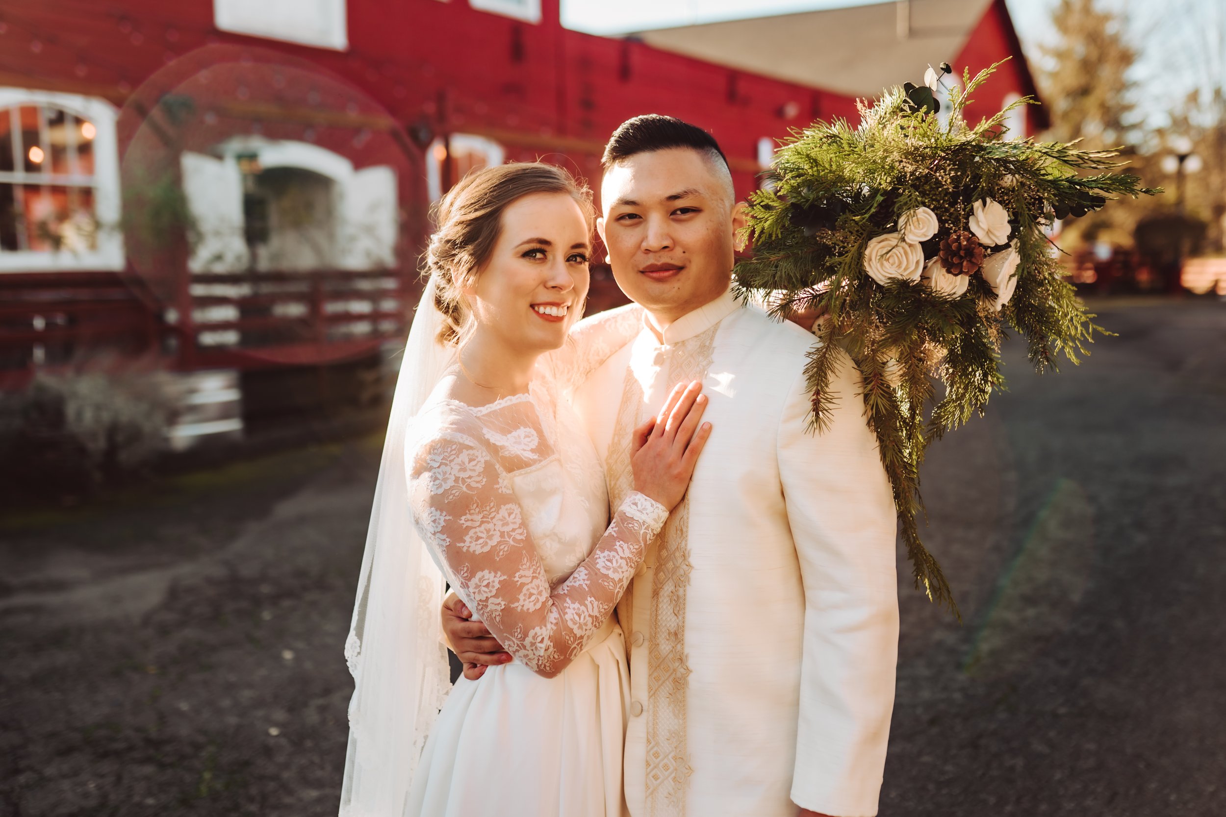 Bride and groom smiling for a portrait