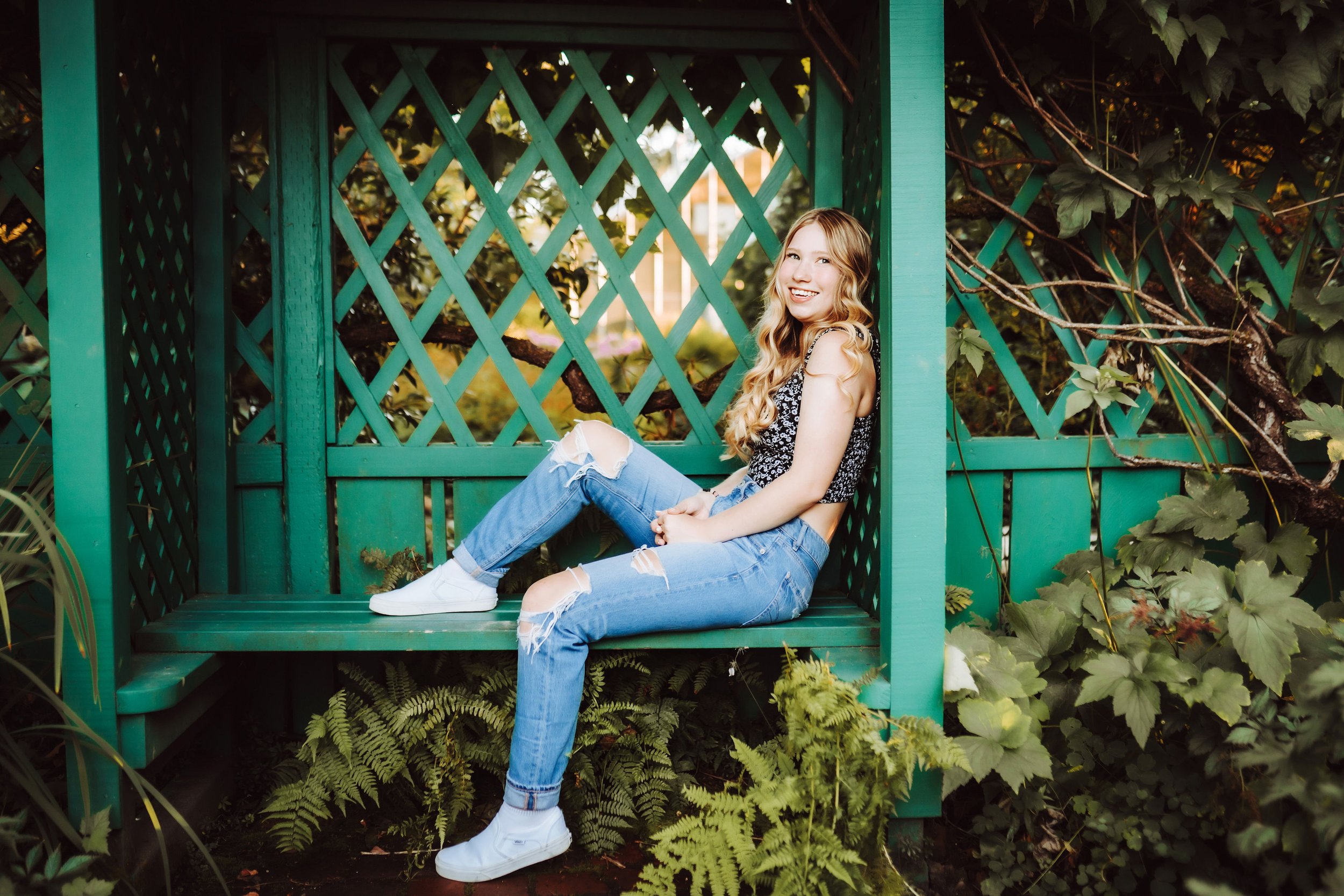 Senior girl on a garden bench