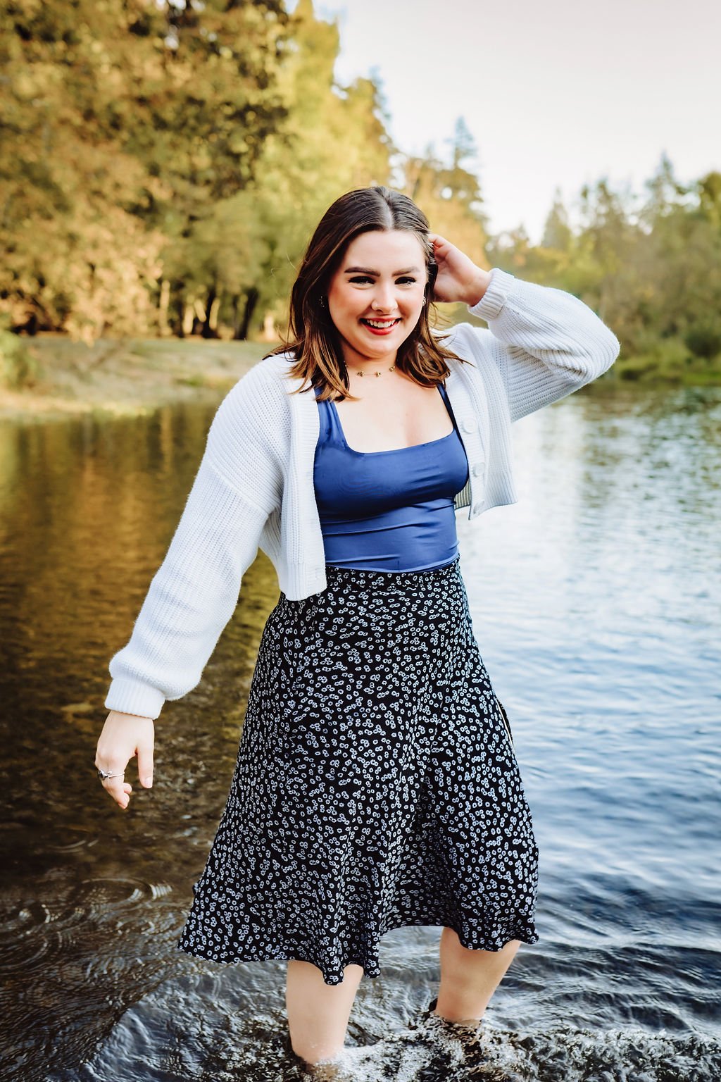 Senior girl walking through water