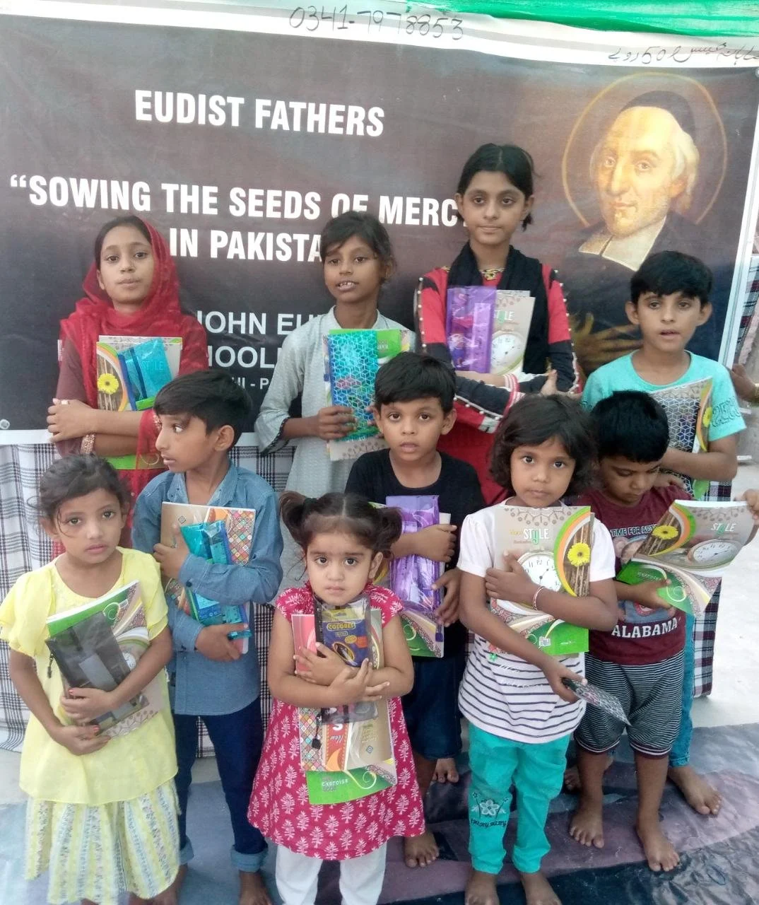Students and families taking part in the St. John Eudes Home Schooling System in Karachi.