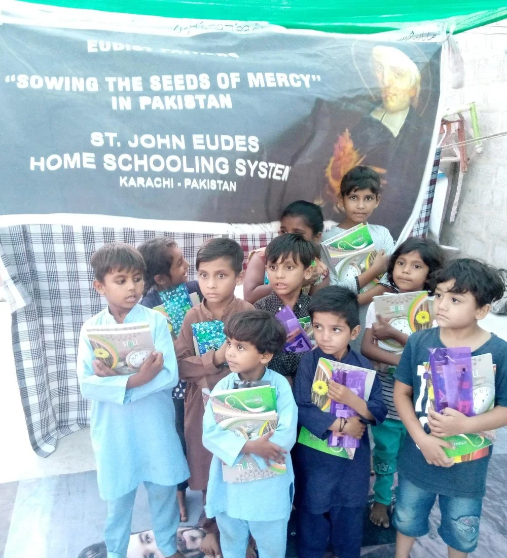 Students and families taking part in the St. John Eudes Home Schooling System in Karachi.