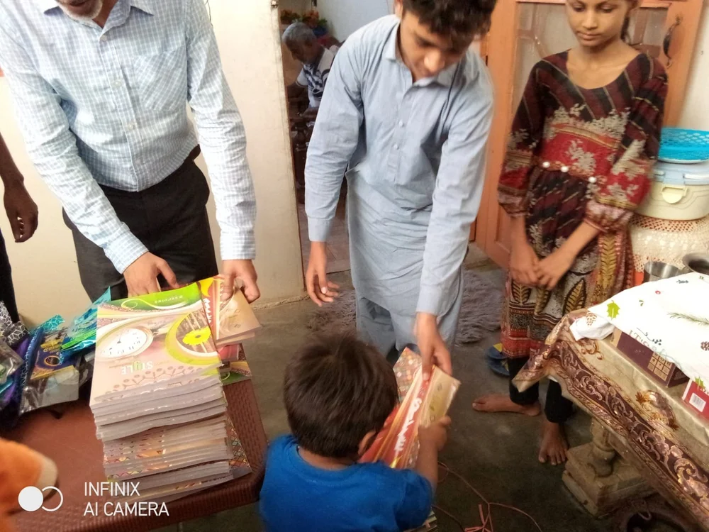 Students and families taking part in the St. John Eudes Home Schooling System in Karachi.
