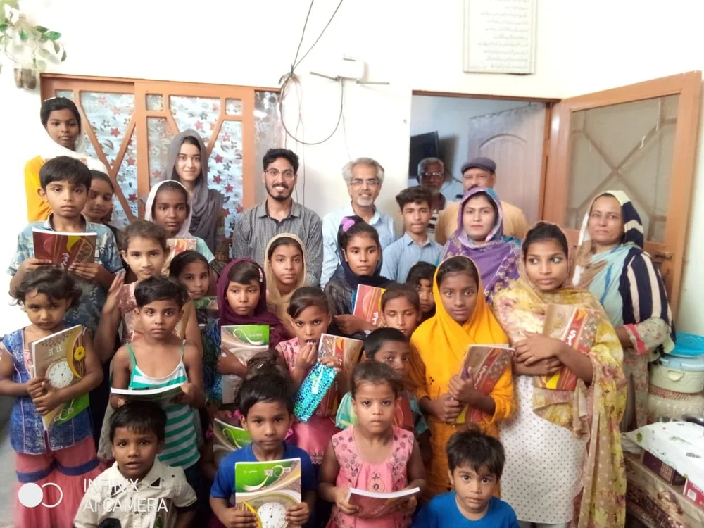 Students and families taking part in the St. John Eudes Home Schooling System in Karachi.