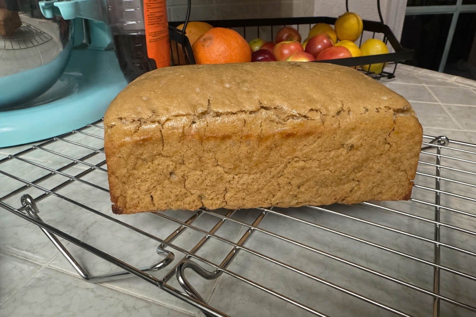 Einkorn sourdough cooling on wire rack