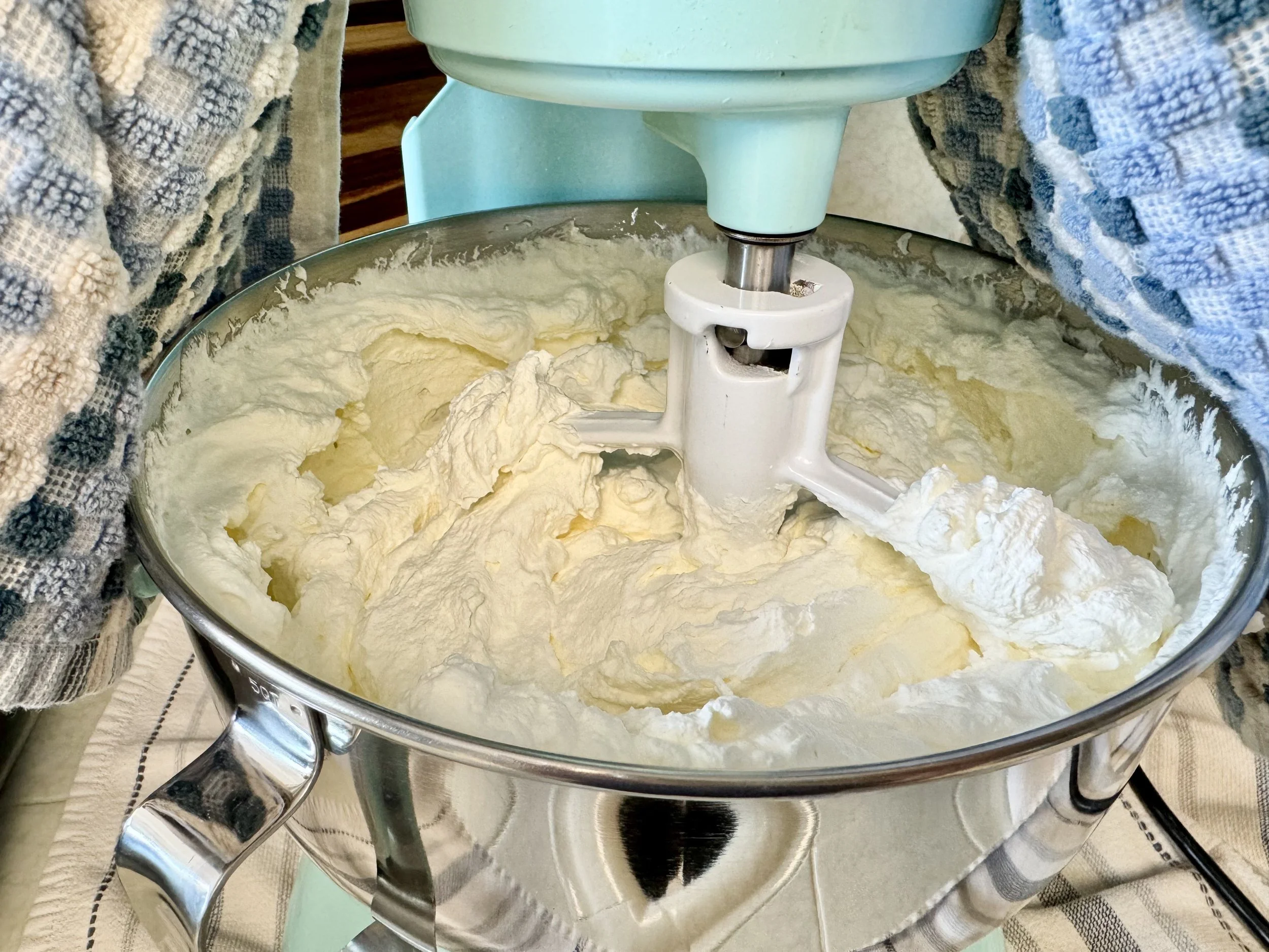 Cream being whipped into butter