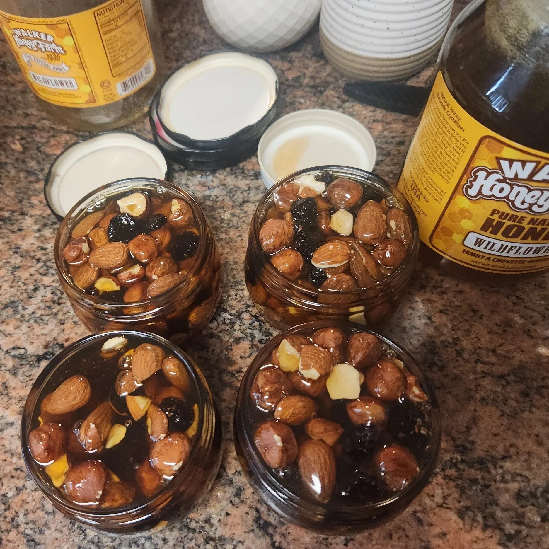 Jars with mixed nuts and honey