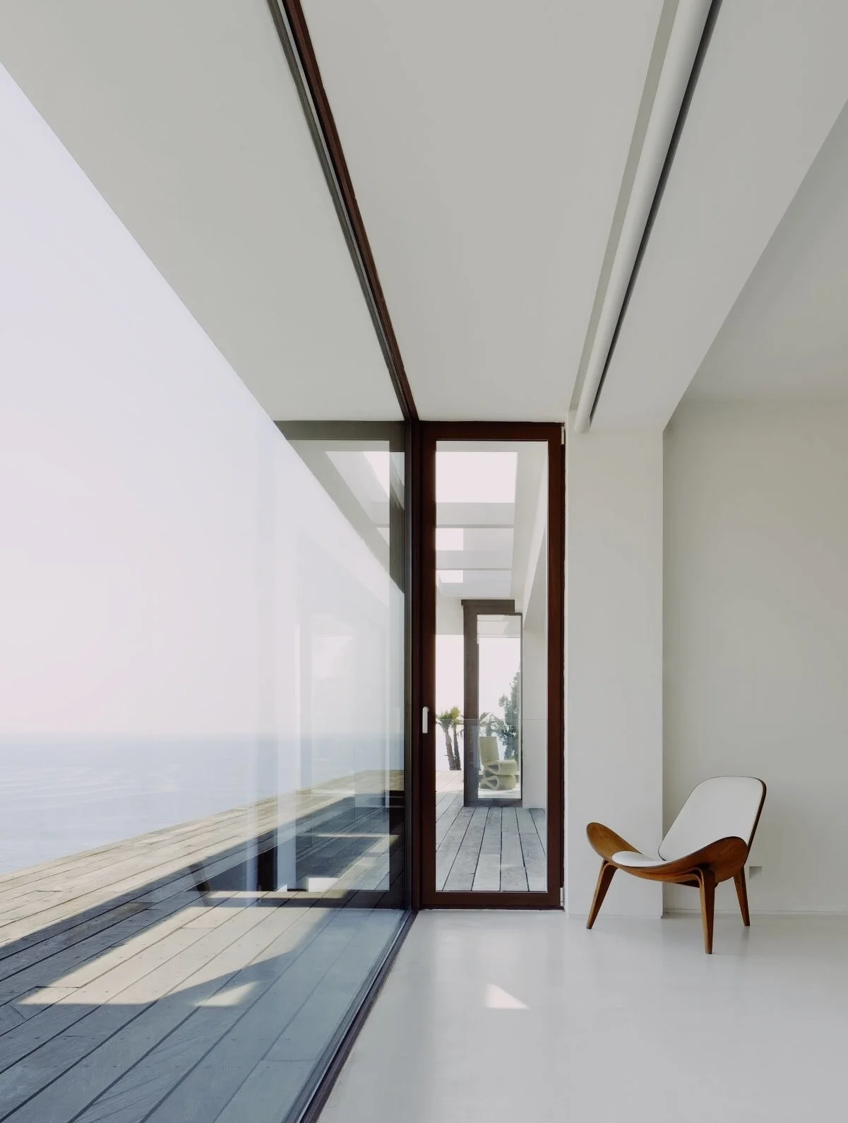 The key is in the details. Private beach access and boat mooring, infinity pool, water front gym, Jacuzzi, Sonos music, separate professional kitchen, live-in housekeepers