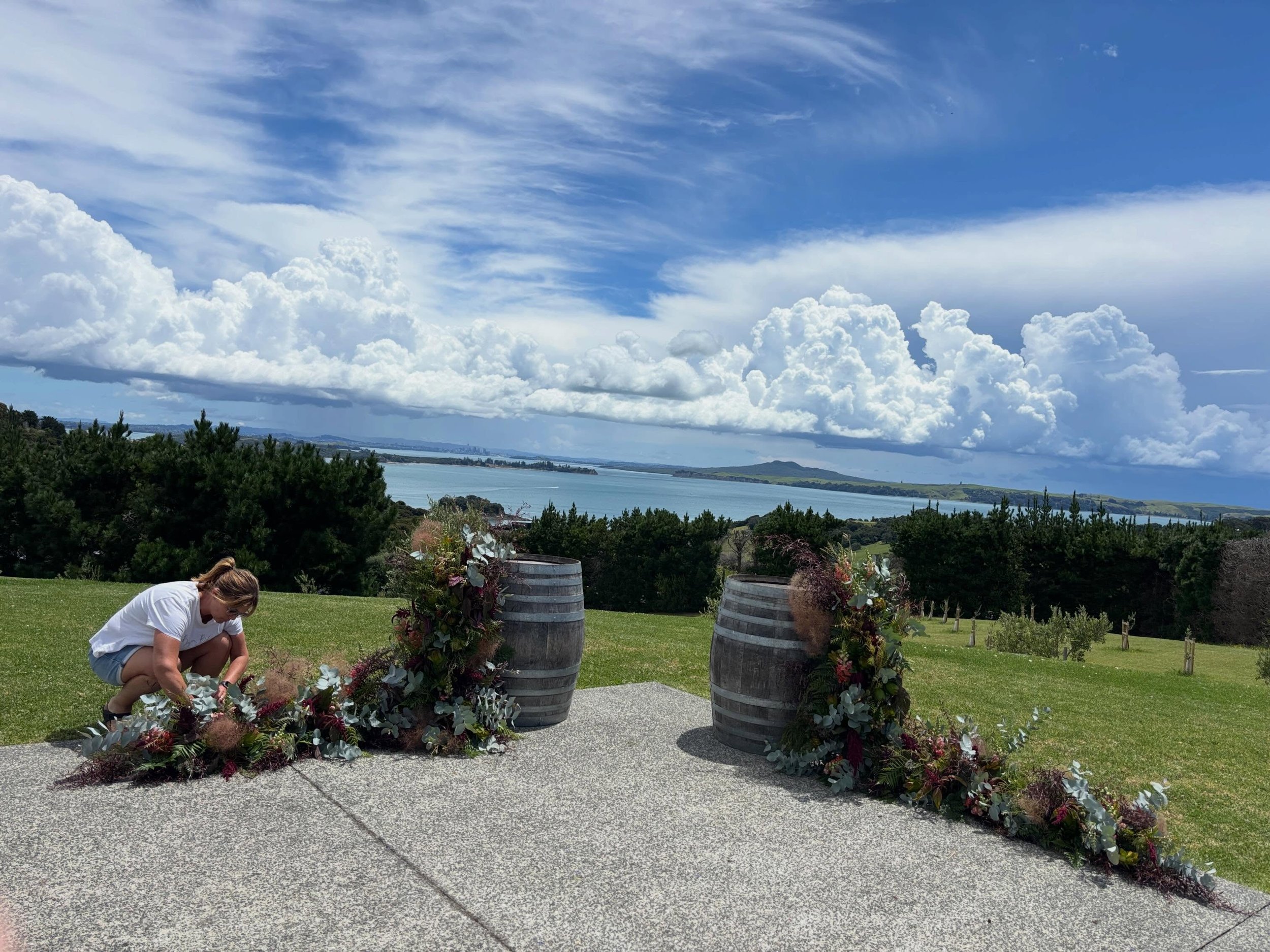 Adding the final touches to this ceremony setup on the beautiful Waiheke Island.
