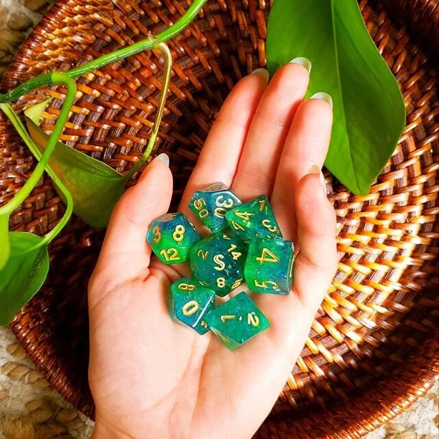 #SinaUna
A gentle swirl of the lush greens of the jungle and the blues of the ocean's water. Flecks of gold rushing through the rivers. Sina Una awaits, the spirits call... Preorders for these dice are happening TODAY! Available at 12pm EST!
I run pr