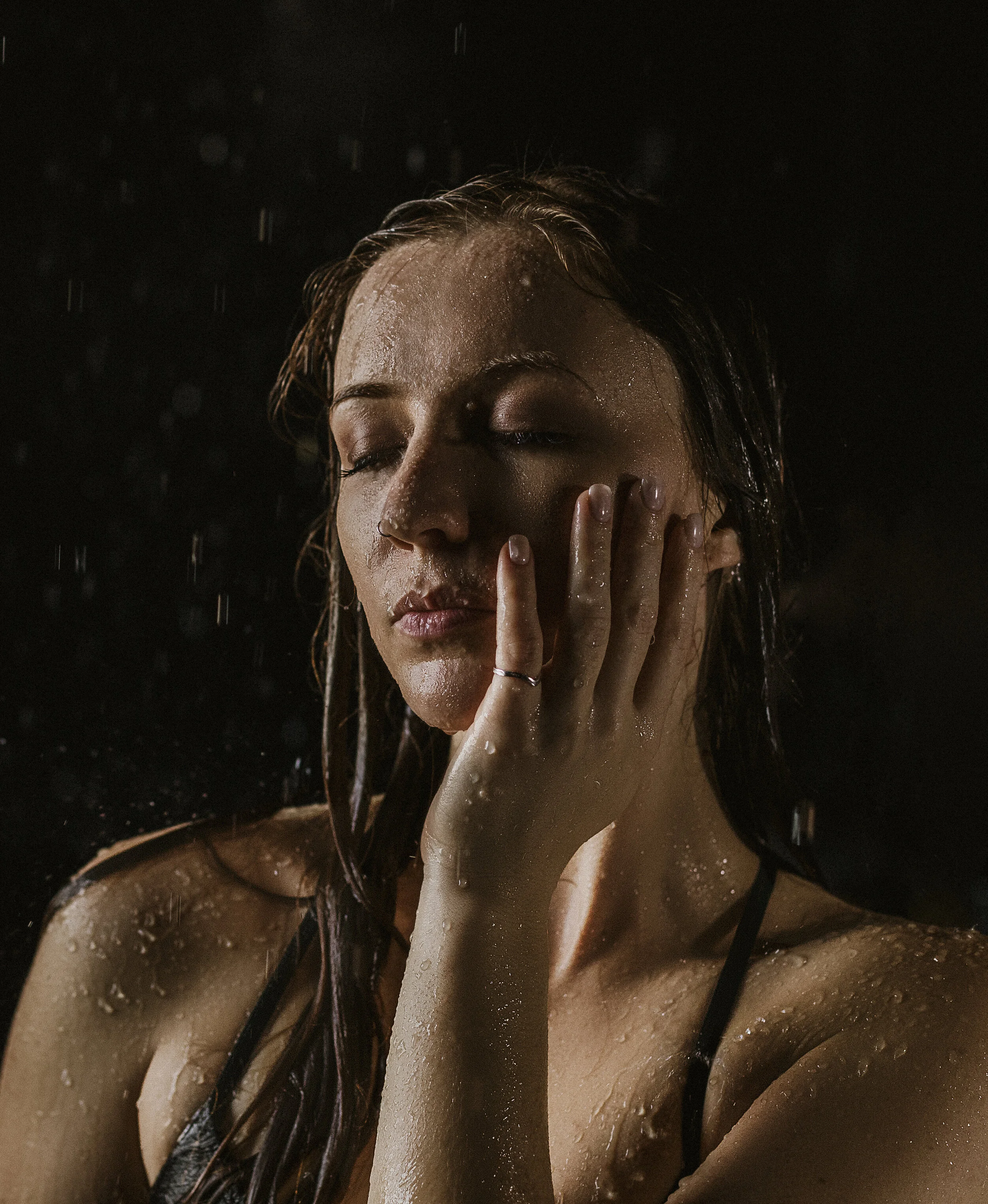 Southern California Boudoir Photography Close Up Of A Woman Standing While Water Is Coming Down On Her Using Natural Light
