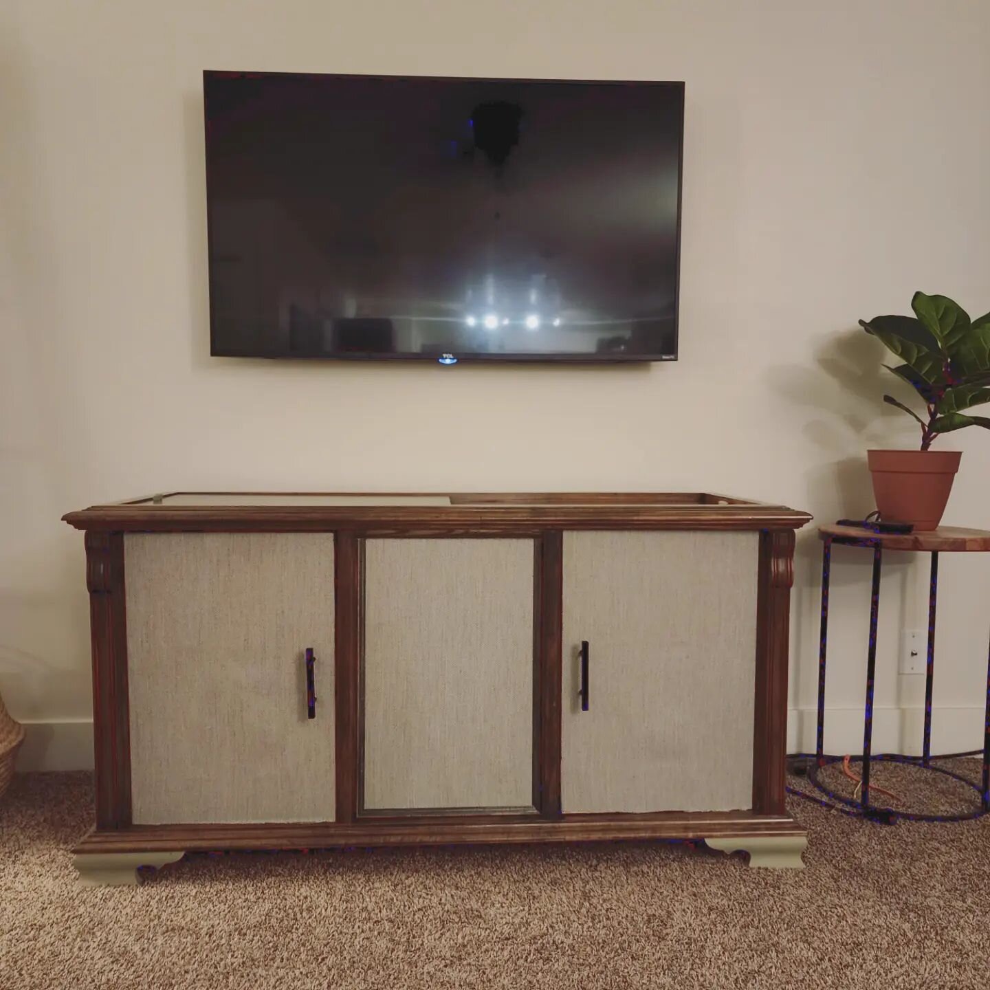 It has taken MONTHS of work for this. It all started when I couldn't stand the original cabinet that MaKell brought home and took out all the record player guts.

I didn't love the look, nor the smell of the cabinet, since it was stored in a shed wit
