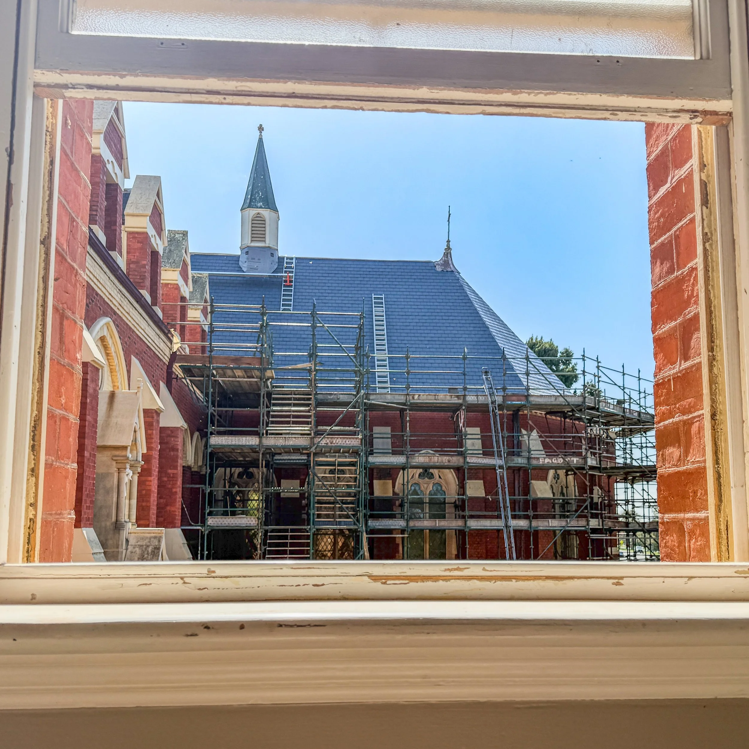  Slate roof replacement in progress  