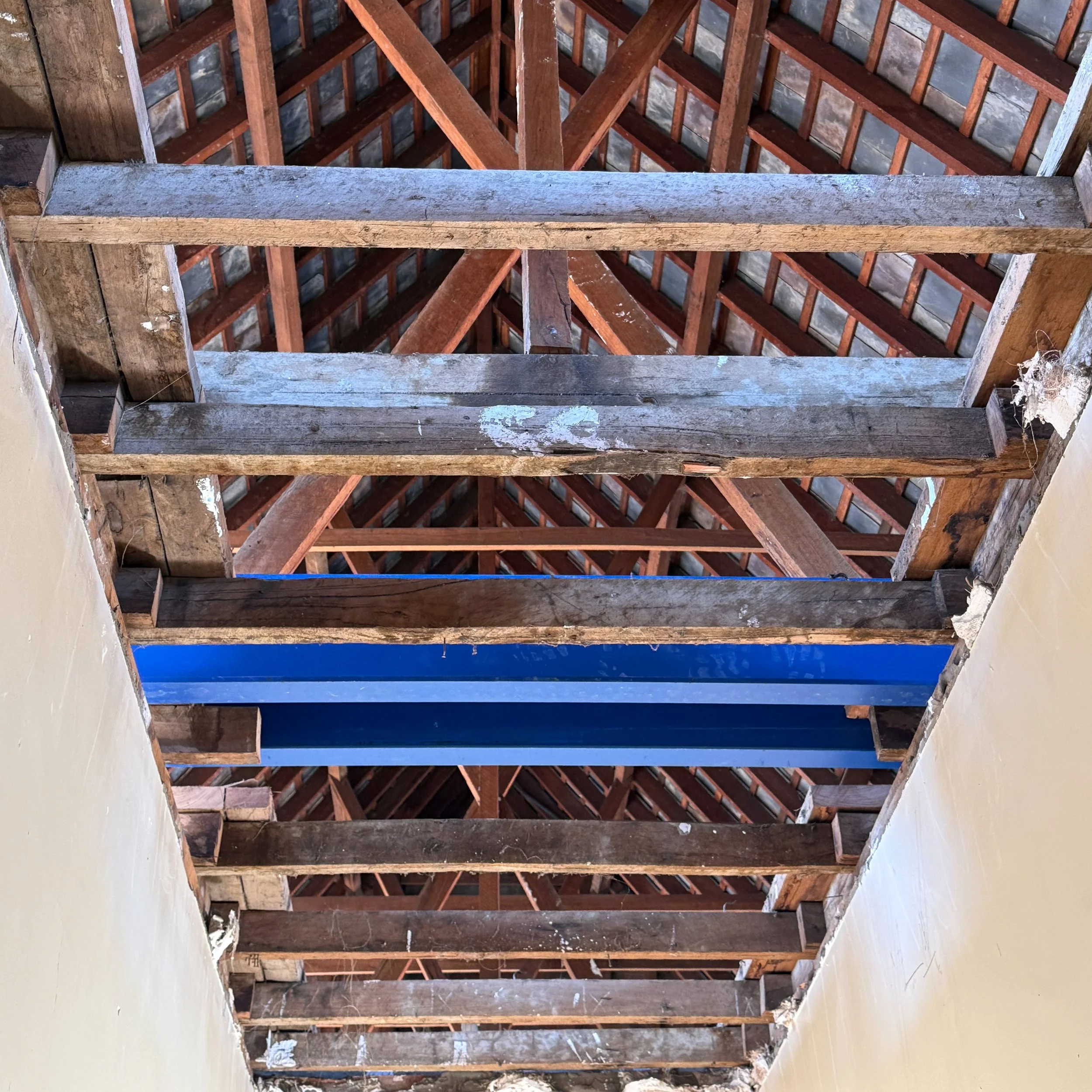  New structural steel alongside original timber frame for additional support 