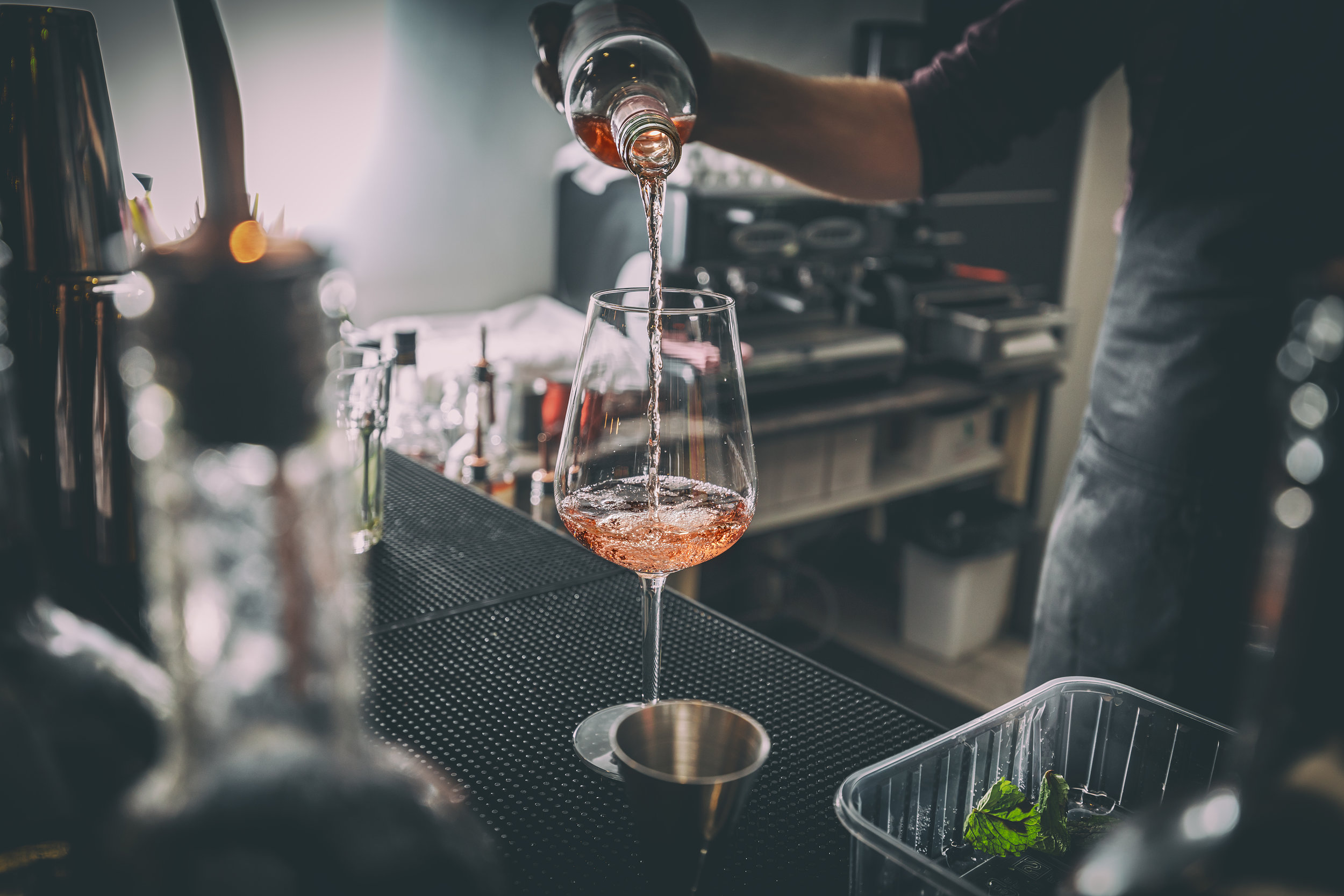bartender-pouring-wine-PXFXX66.jpg