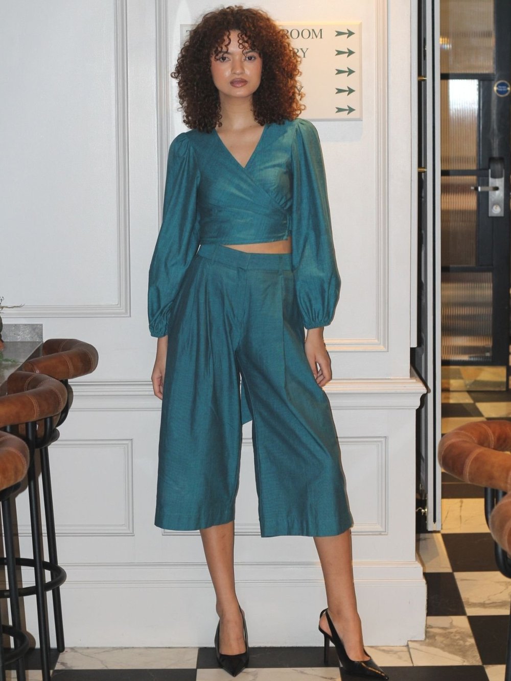 teal cropped trousers and matching wrap top