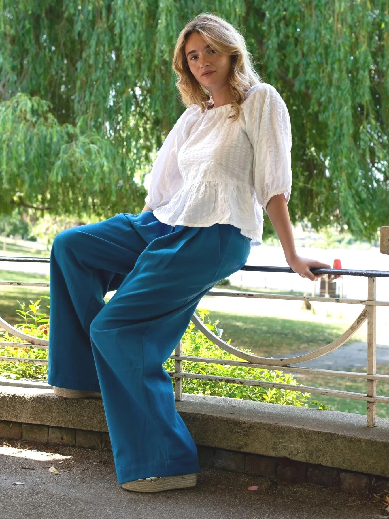 Blue-organic-cotton-trousers-and-white-peplum-top.jpg