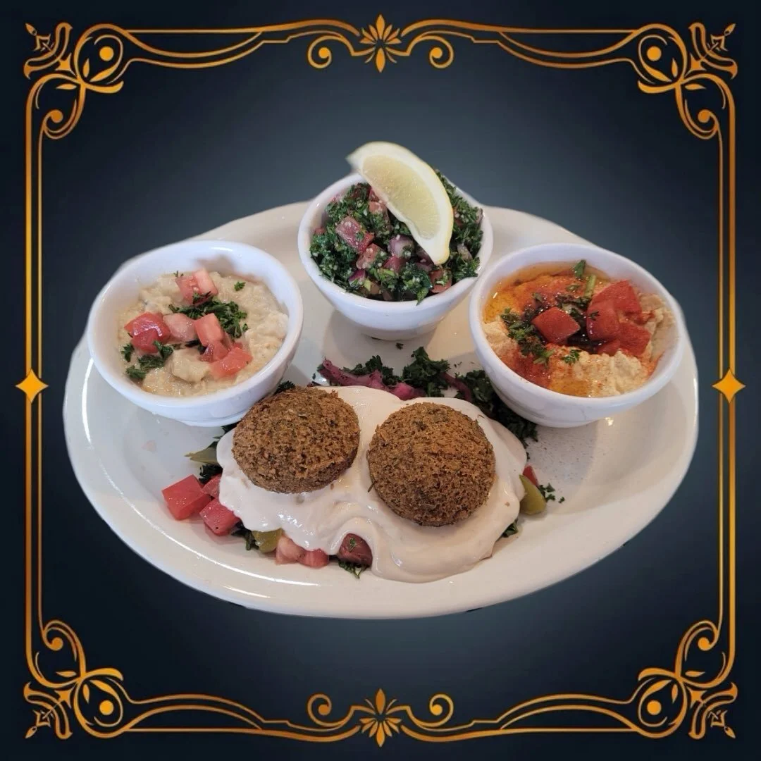Having a hard time deciding which appetizer to get? Try our Mazza Plate!

You can select four items from eight different options: Hummus, Baba Ganoush, Falafel, Spanakopita, Dolmathes, Tabouli, Feta, or Olives. There&rsquo;s something for everyone!

