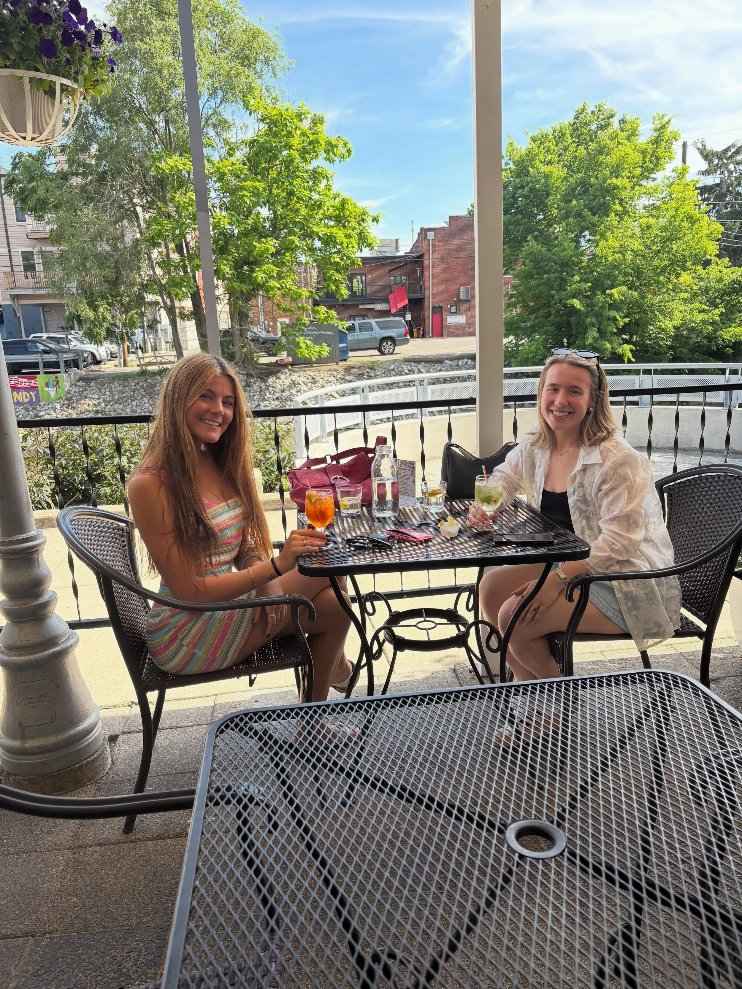 When your day off still brings you to Canal Bistro, you know you&rsquo;re
in the right place.
Meredith and Zoe stopped by to enjoy some sunshine along the canal with two of our favorite patio cocktails-the Hugo Spritz and Aperol Spritz. Fresh air, go