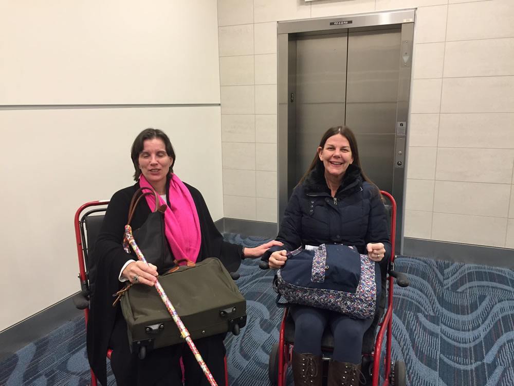 My companion* and dear friend Catherine also has a deeply debilitating disease called EDS so here we are being wheeled through Atlanta airport together.